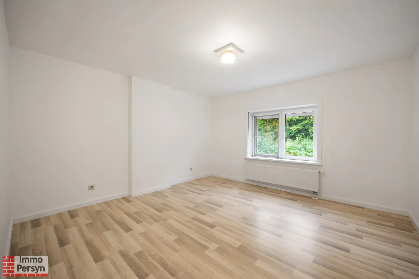 Instapklare rijwoning aan de stadsrand van Diest foto 8