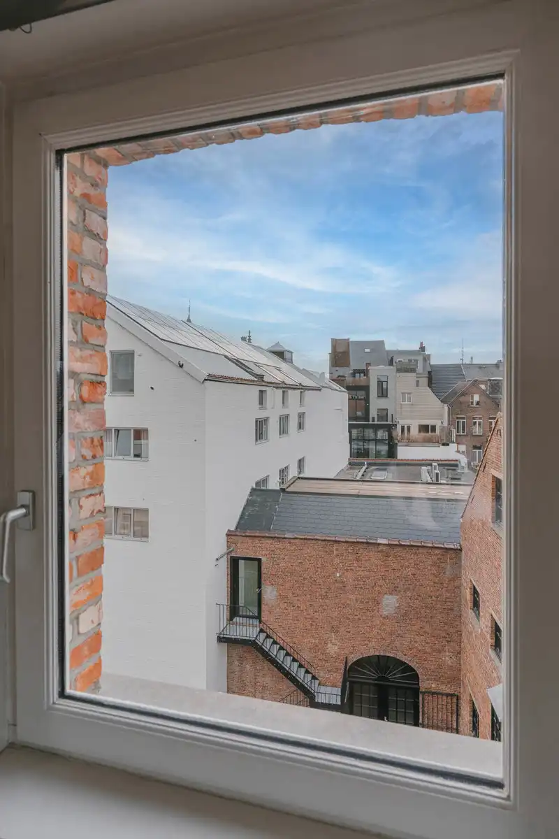 Uniek en ruim duplex-appartement in hartje Mechelen foto 31