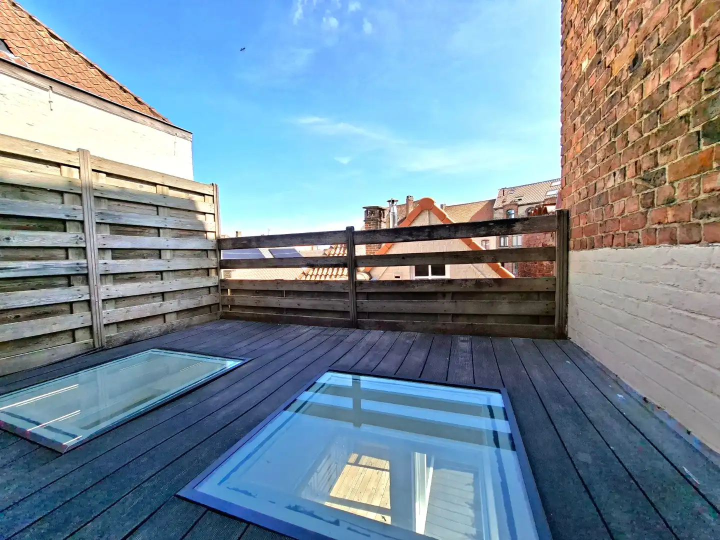 Ruim triplex appartement met 2 terrassen foto 14