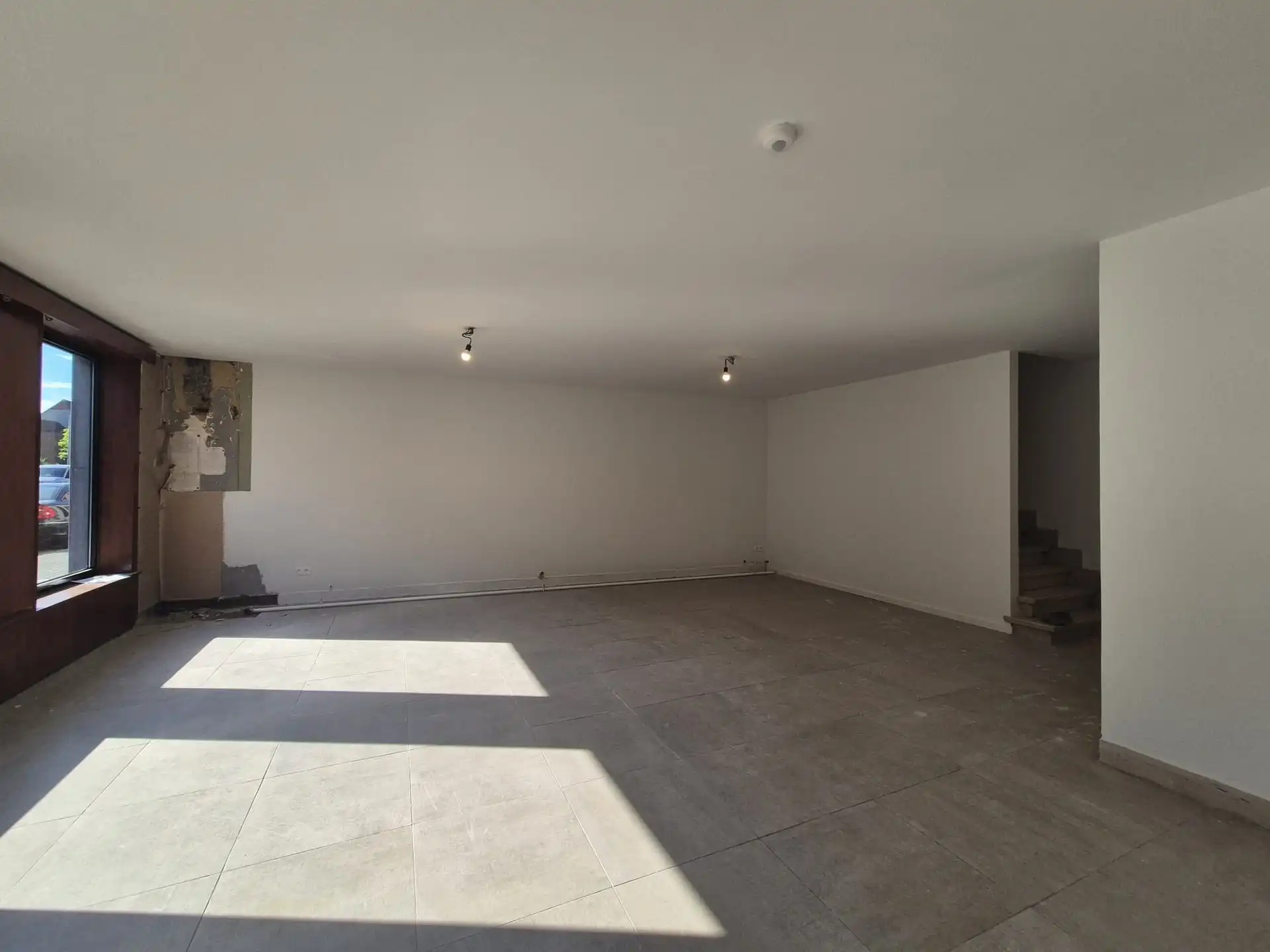 Ruim triplex appartement met polyvalente ruimte op toplocatie in het hart van Wetteren foto 28