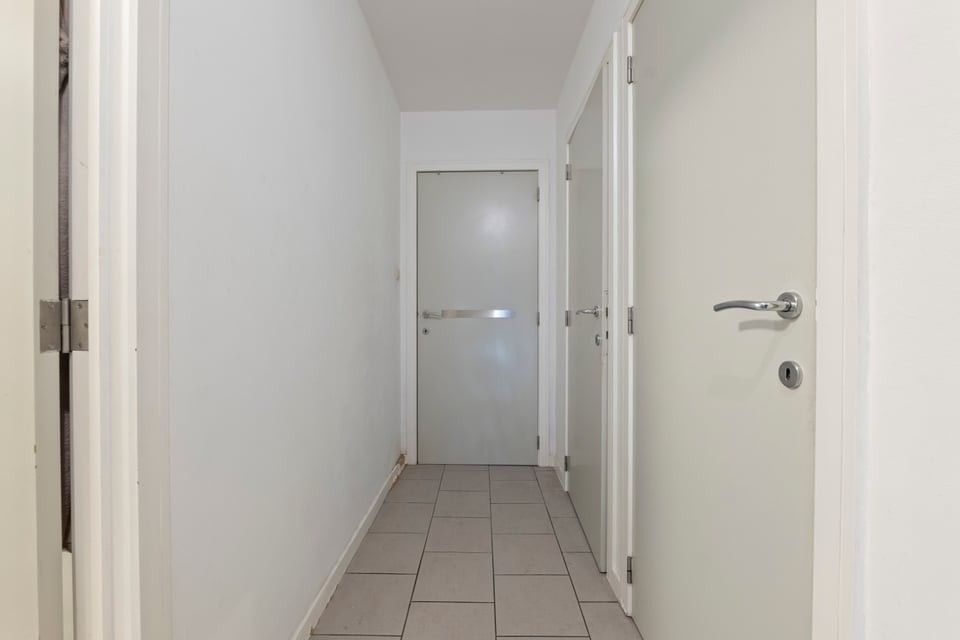 KNAP HANDELSPAND MET TWEE APART VERHUURDE APPARTEMENTEN IN HET CENTRUM VAN SINT-TRUIDEN foto 35