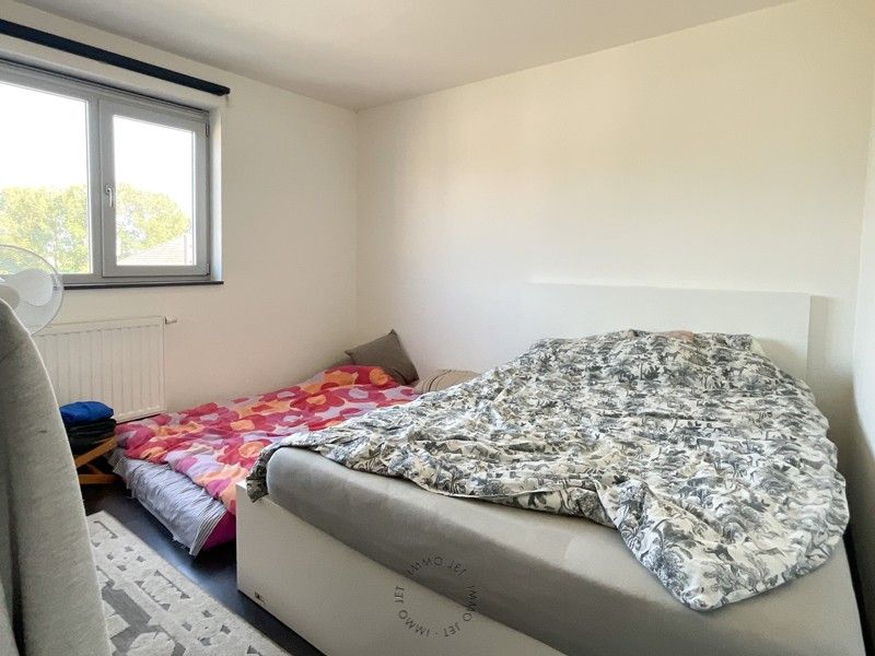 Centraal gelegen appartement met twee slaapkamers, terras en garage foto 8