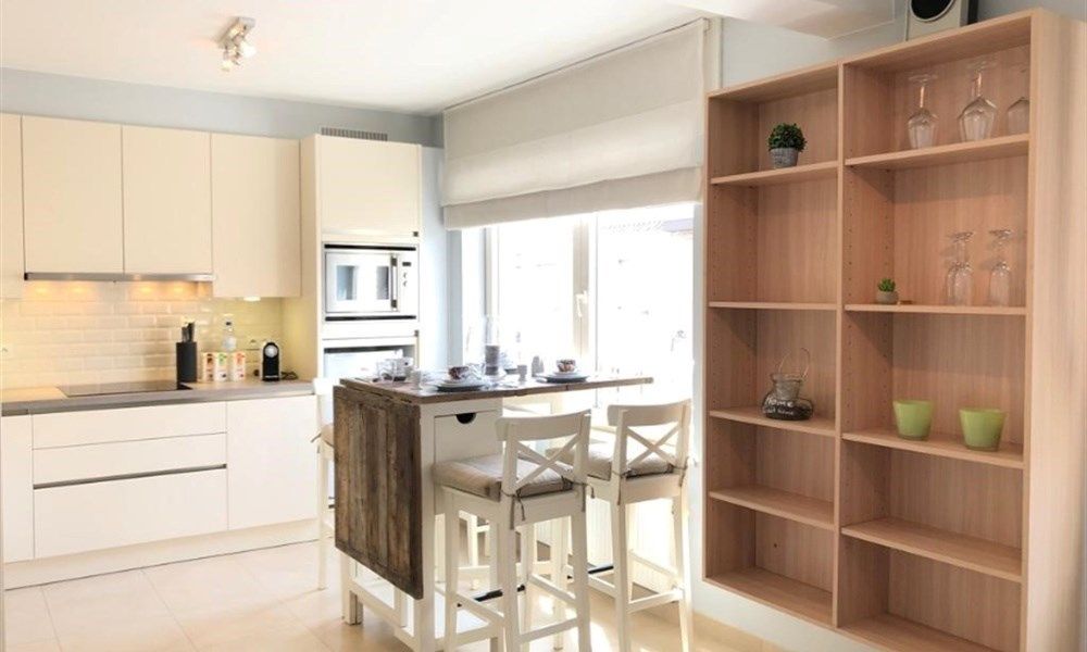Ruime kangoeroewoning met tuin, terras en garage in Knokke, bouwjaar 1963, 3 slaapkamers, EPC-waarde 183.00, 2 badkamers, perceeloppervlakte 125.00, bewoonbare  foto 11