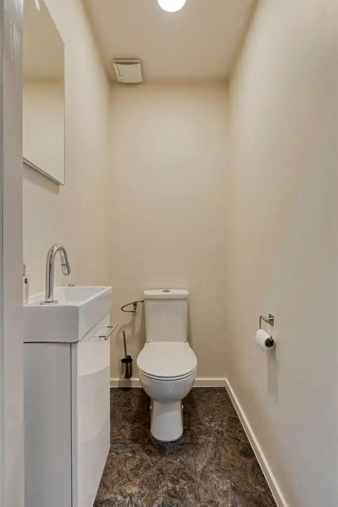 Vrijstaande woning met 3 slaapkamers, inpandige garage en een omheinde tuin, rustig gelegen nabij het centrum van Maaseik. foto 15