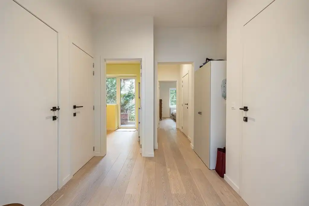Instapklaar appartement met ruime tuin foto 8