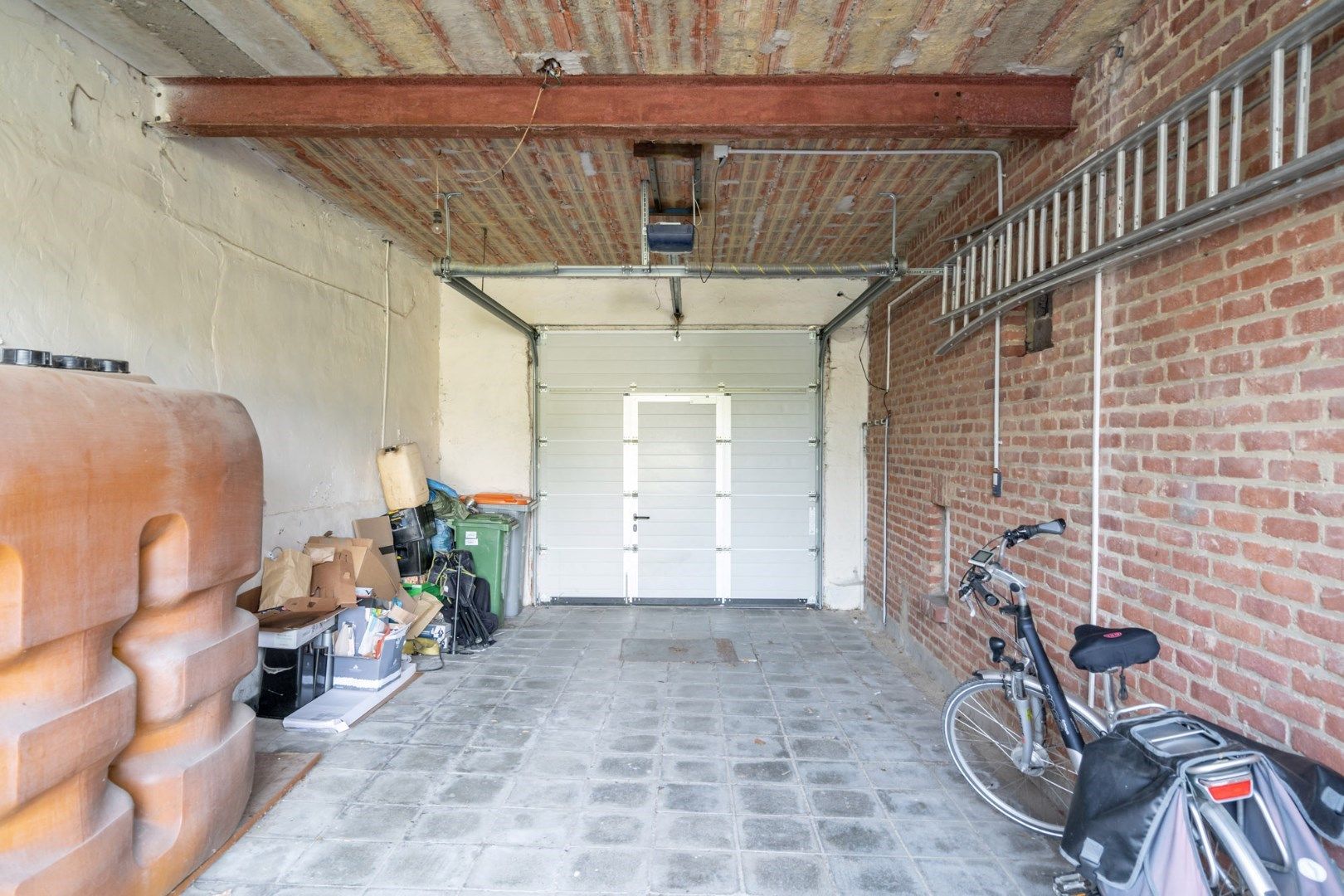 - IN OPTIE - Ruime degelijke rijwoning met doorrit naar de tuin met binnenkoer, op 12a10ca foto 39