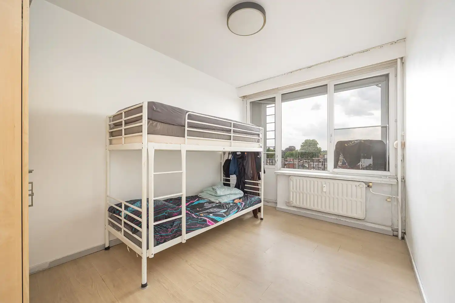 Ruim hoekappartement (3 SLK + terras) met enorm potentieel en groen zicht aan het Rivierenhof te Deurne-Zuid foto 13