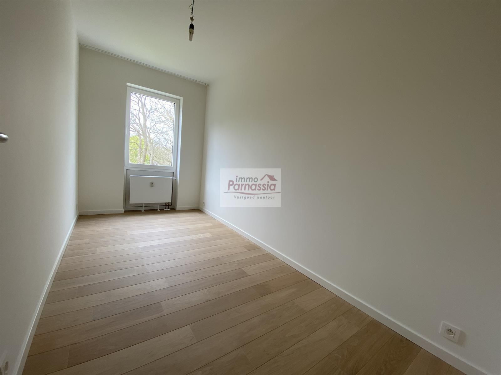 Volledig gerenoveerd appartement met gemeenschappelijke tuin foto 13
