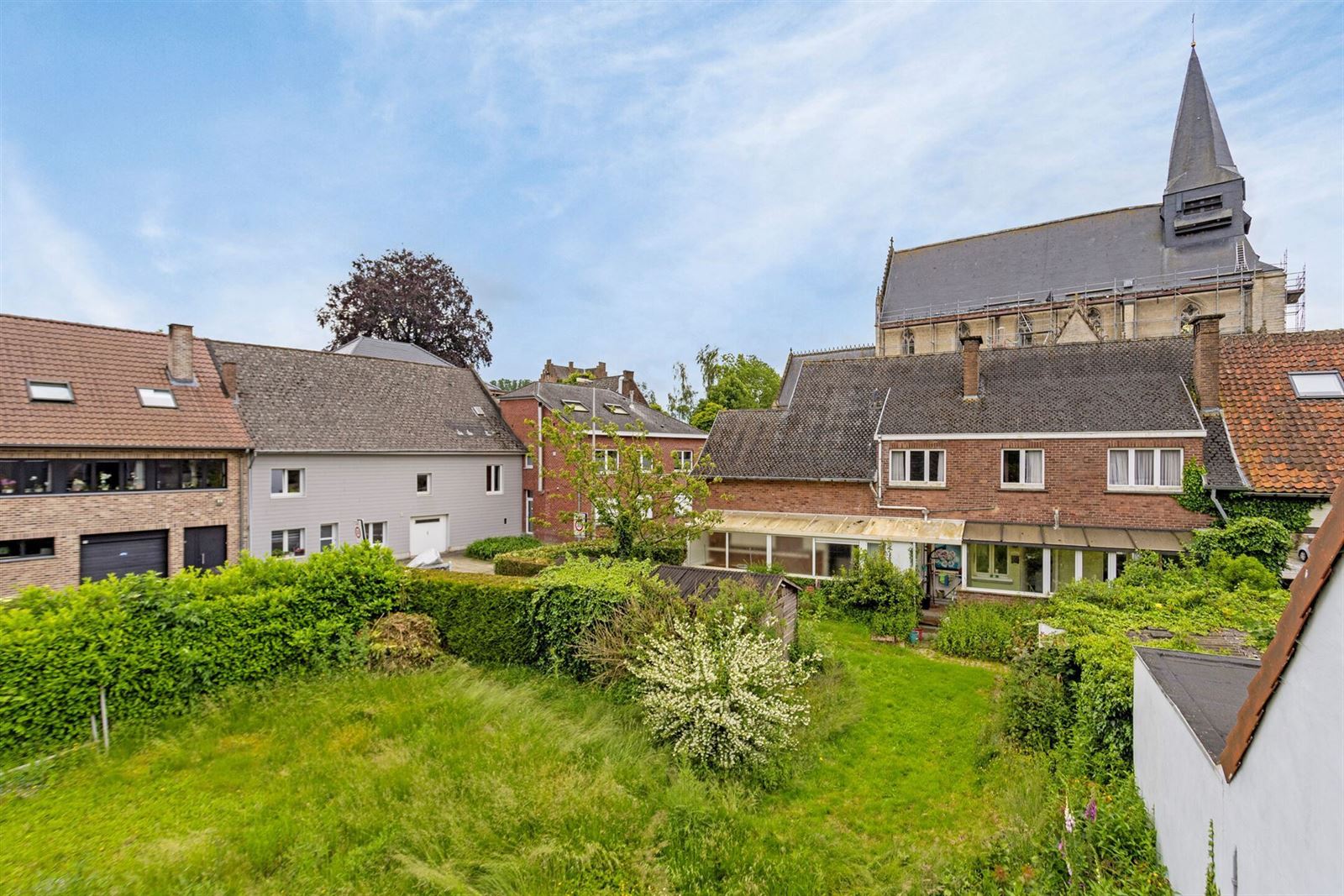 Ruime woning met 5 slaapkamers en aparte handelsruimte + tuin foto 33