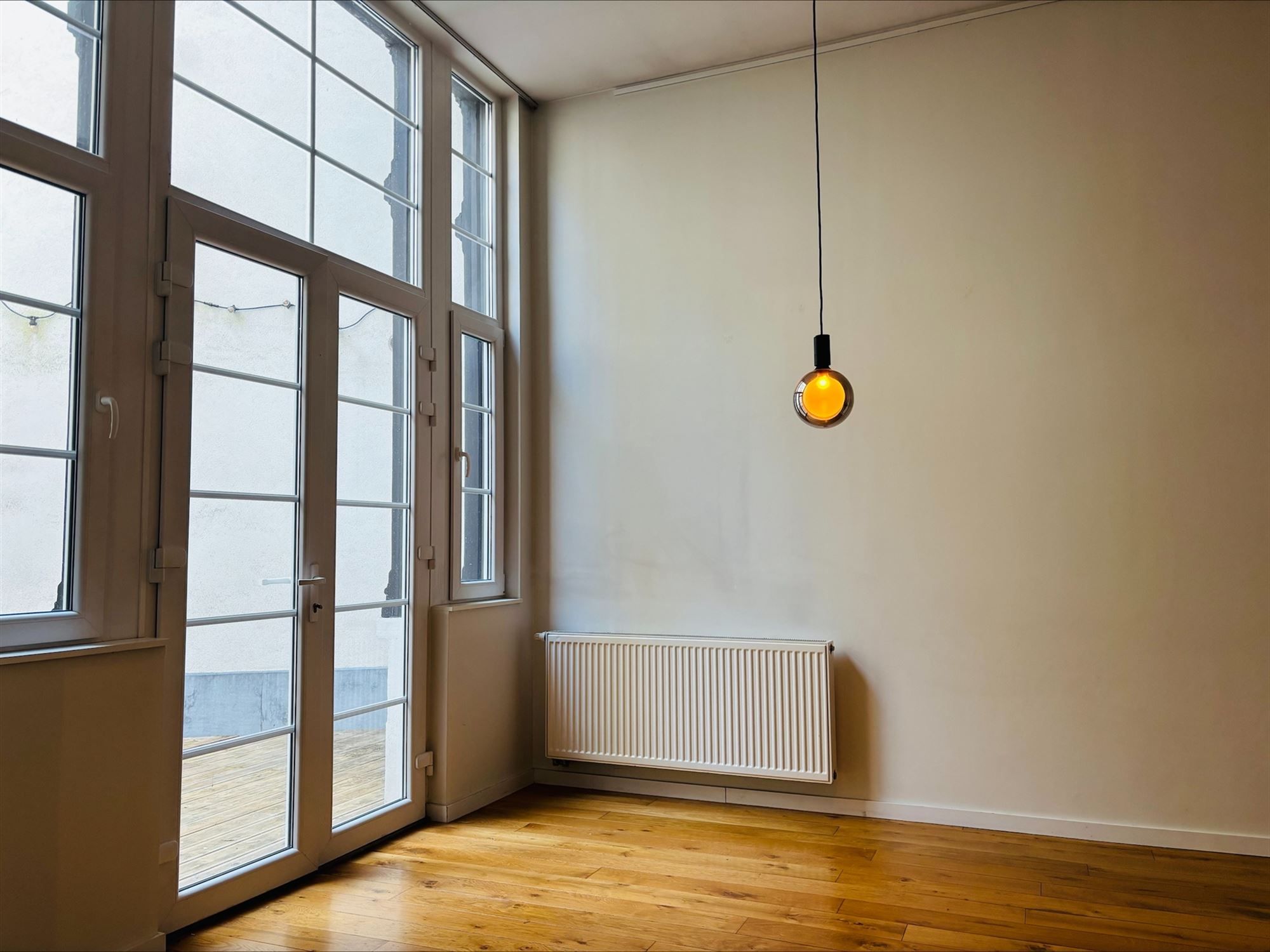 Karaktervol en lichtrijk 1-slaapkamerappartement met ruim terras op toplocatie! foto 6