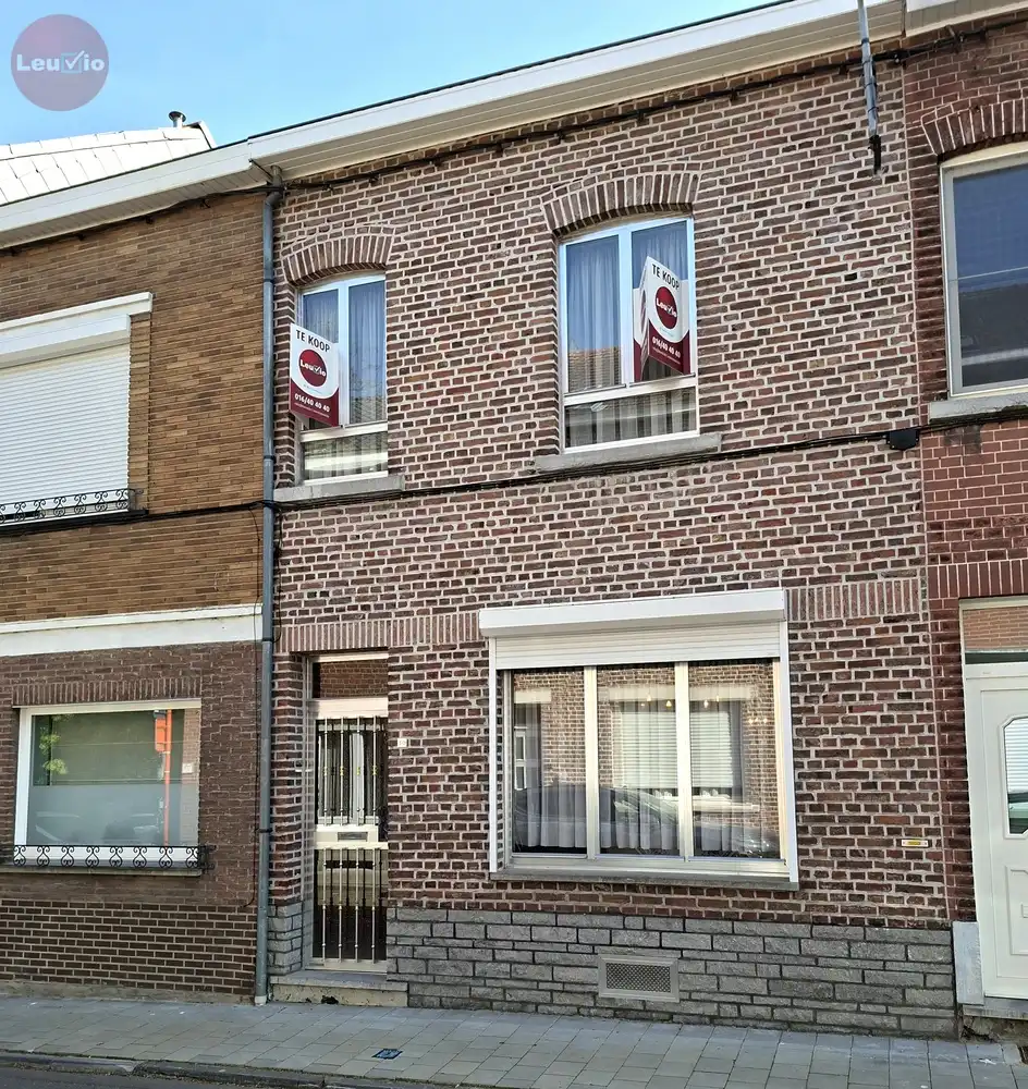 Goed gelegen woning // 2 slaapkamers + zolder om af te werken foto 2