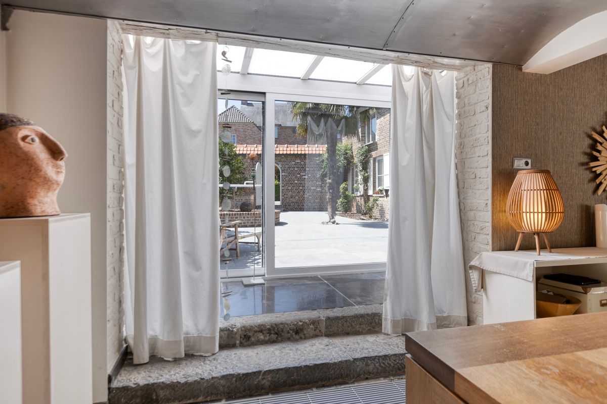 Authentieke hoevewoning met gezellige binnenkoer foto 12