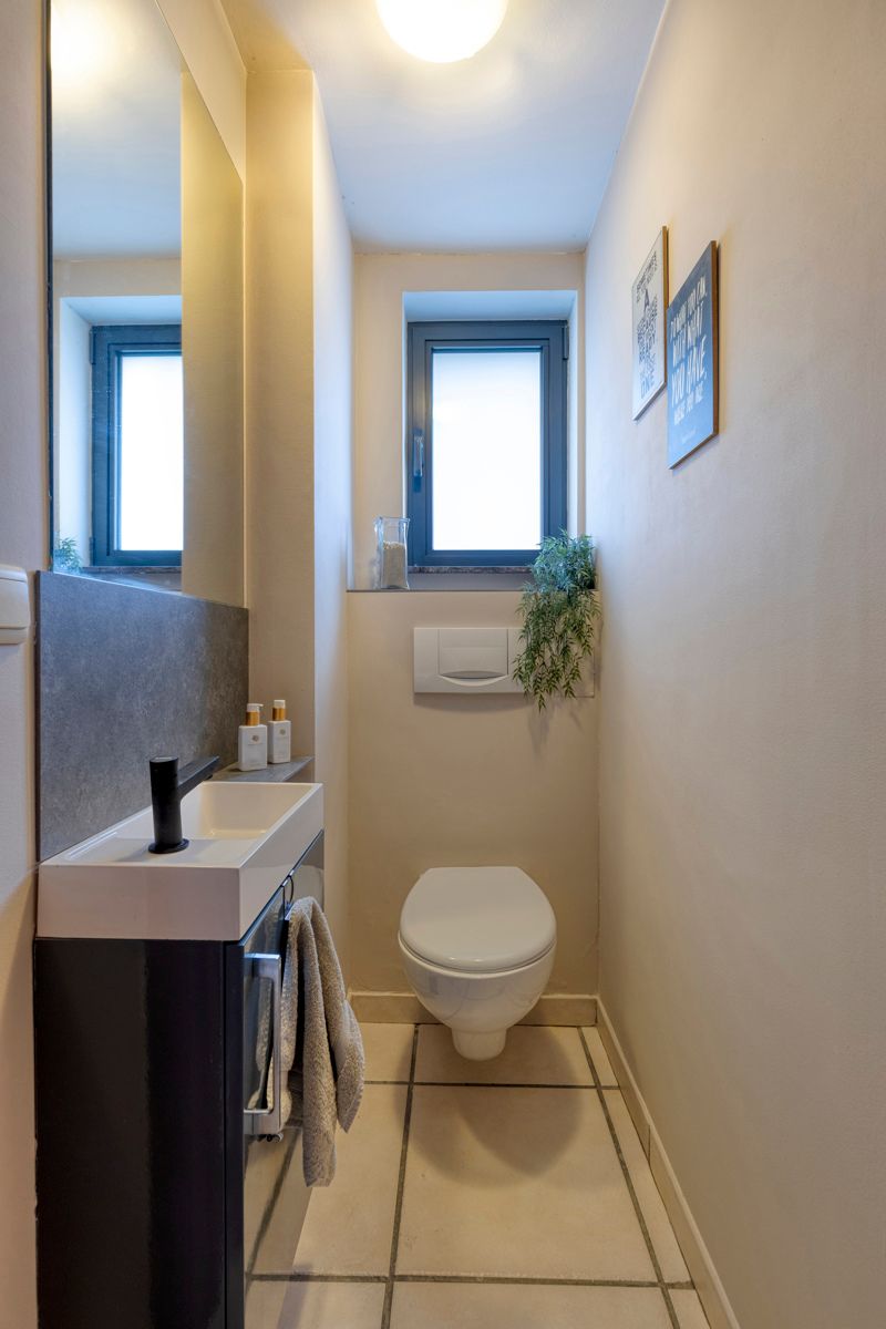 Ruime woning met 4 slaapkamers, garage en tuin foto 12
