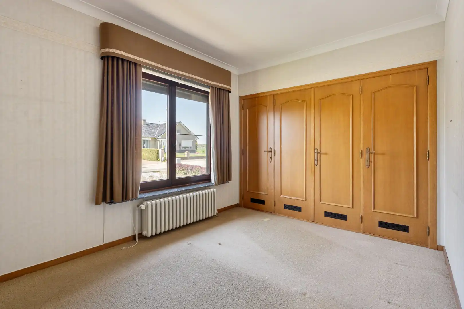 Gelijkvloerse gezinswoning op een ruim perceel van 9a51ca op een rustige locatie met uitzicht op achterliggende weilanden!  foto 17