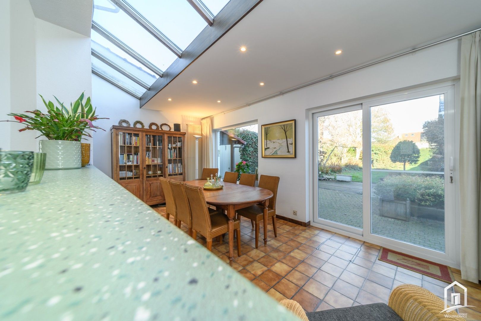 Instapklare halfopen bebouwing met tuin en garages in Denderleeuw foto 4