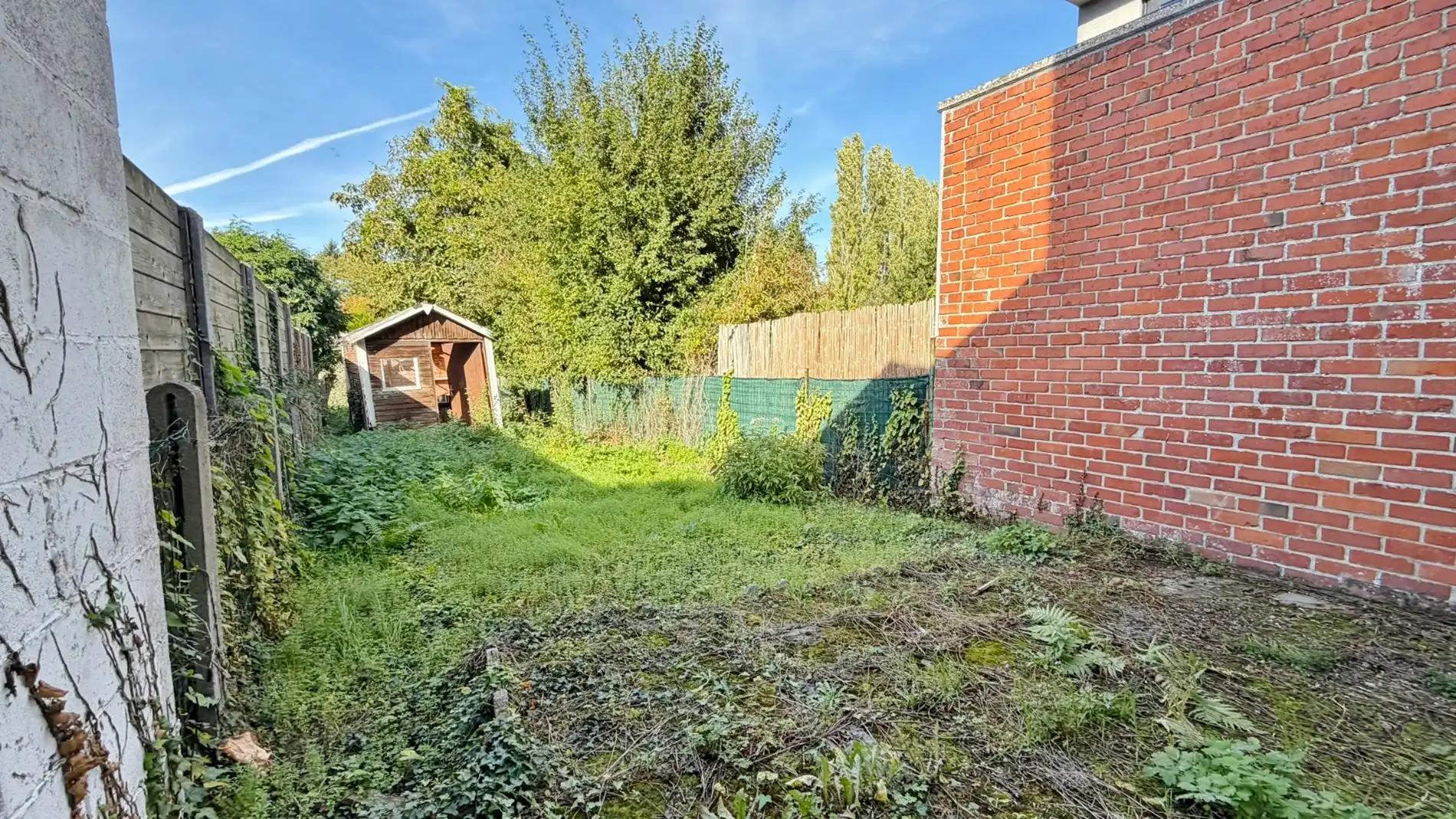 Te renoveren stadswoning met tuin en toegang langs achter met auto/fiets. foto 14