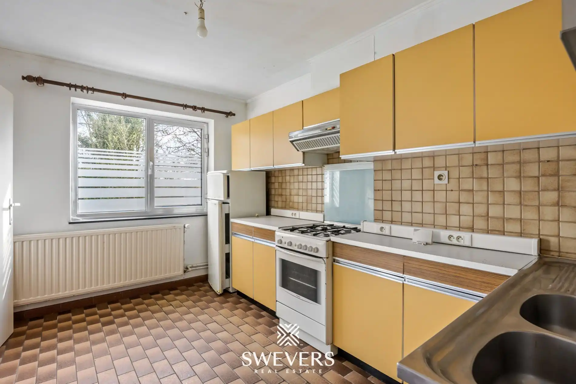 Ruime te renoveren woning op zonnig perceel van 2.325 m² nabij centrum Zonhoven foto 5