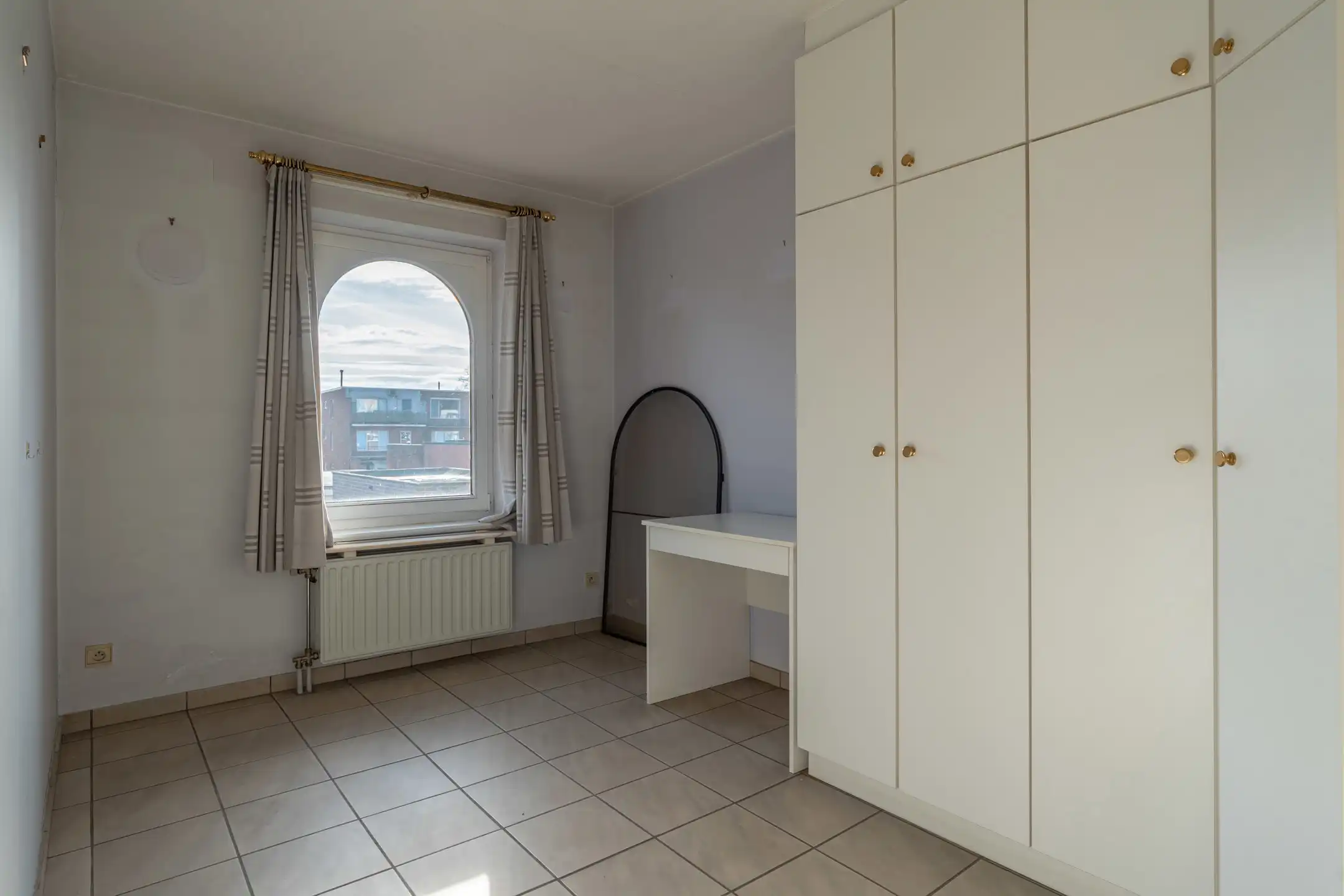 Goed onderhouden, gunstig gelegen 2 slpk app met garagebox. foto 19