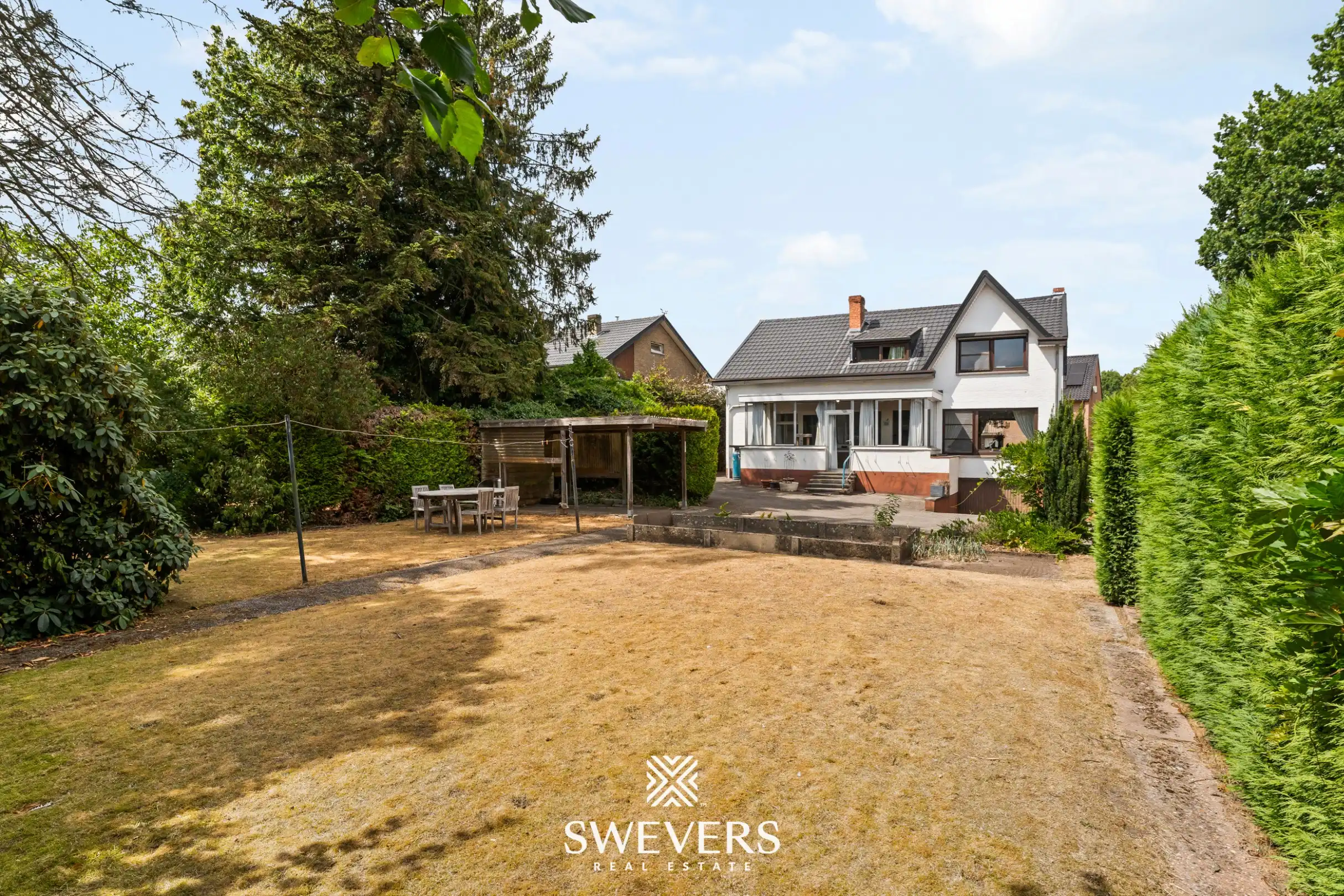 Uitstekend gelegen woning met 4 slaapkamers en mooie tuin foto 32