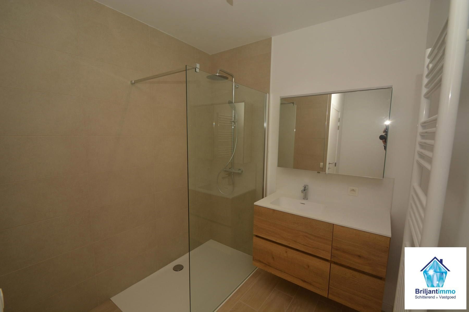 Ongelooflijk tof BEN appartement incl staanplaats en terras foto 12