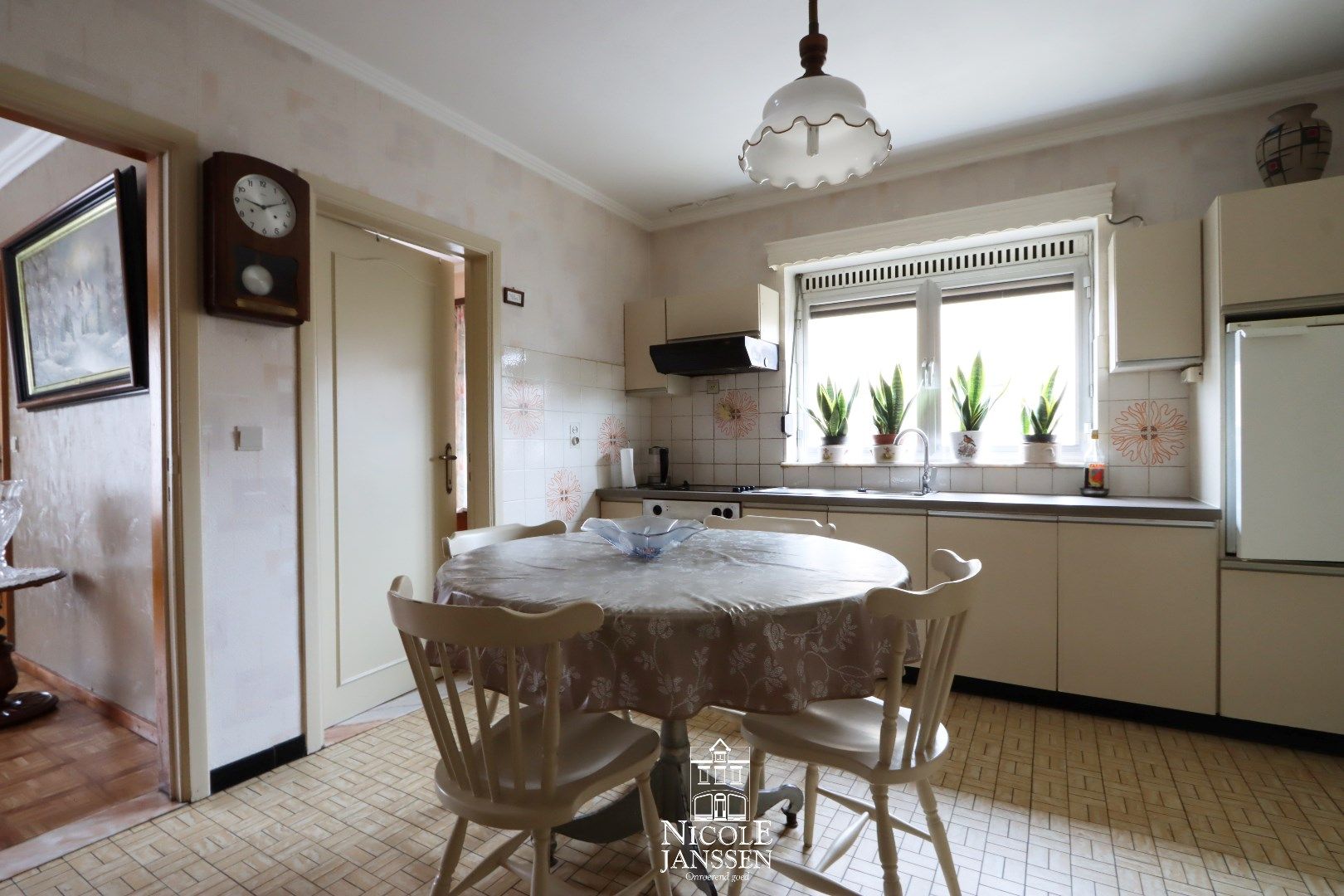 Verzorgde gelijkvloerse woning met tuin in verzorgde straat in centrum van Dilsen foto 11