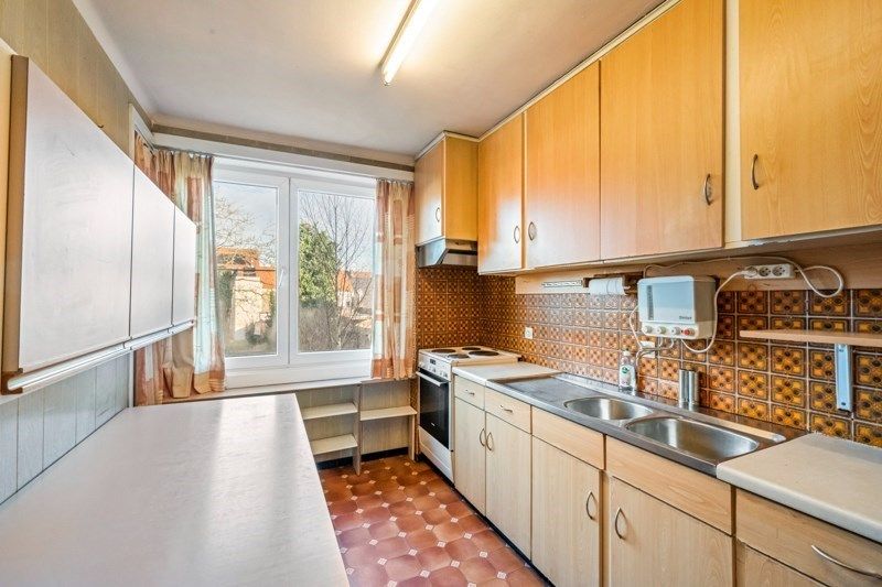 Ruime te renoveren rijwoning met zeer veel mogelijkheden en tuin foto 4