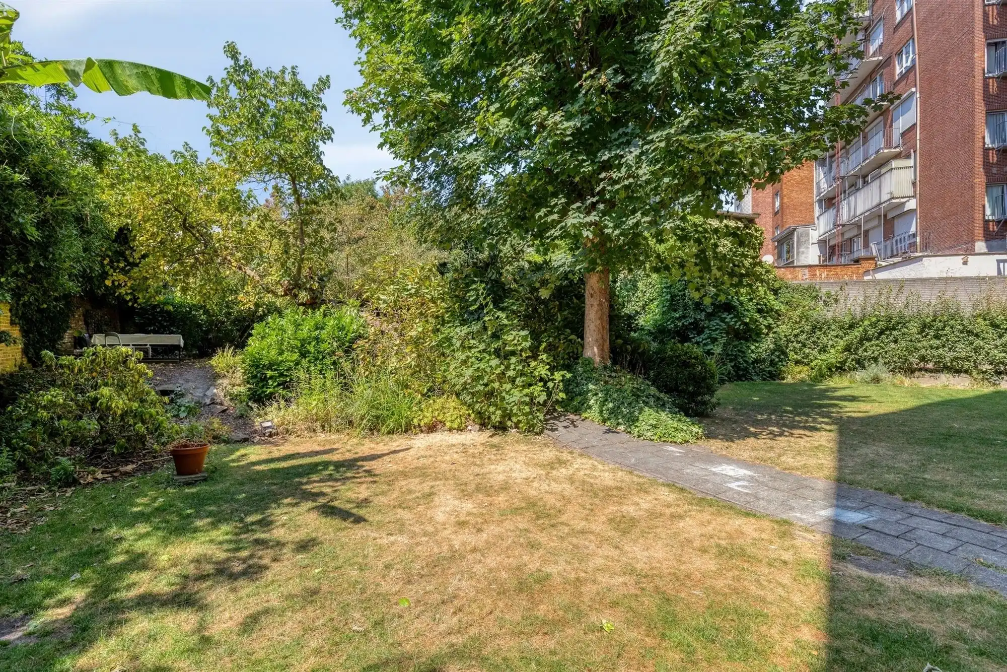 Lichtrijk appartement met 1 slaapkamer en gemeenschappelijke tuin foto 16