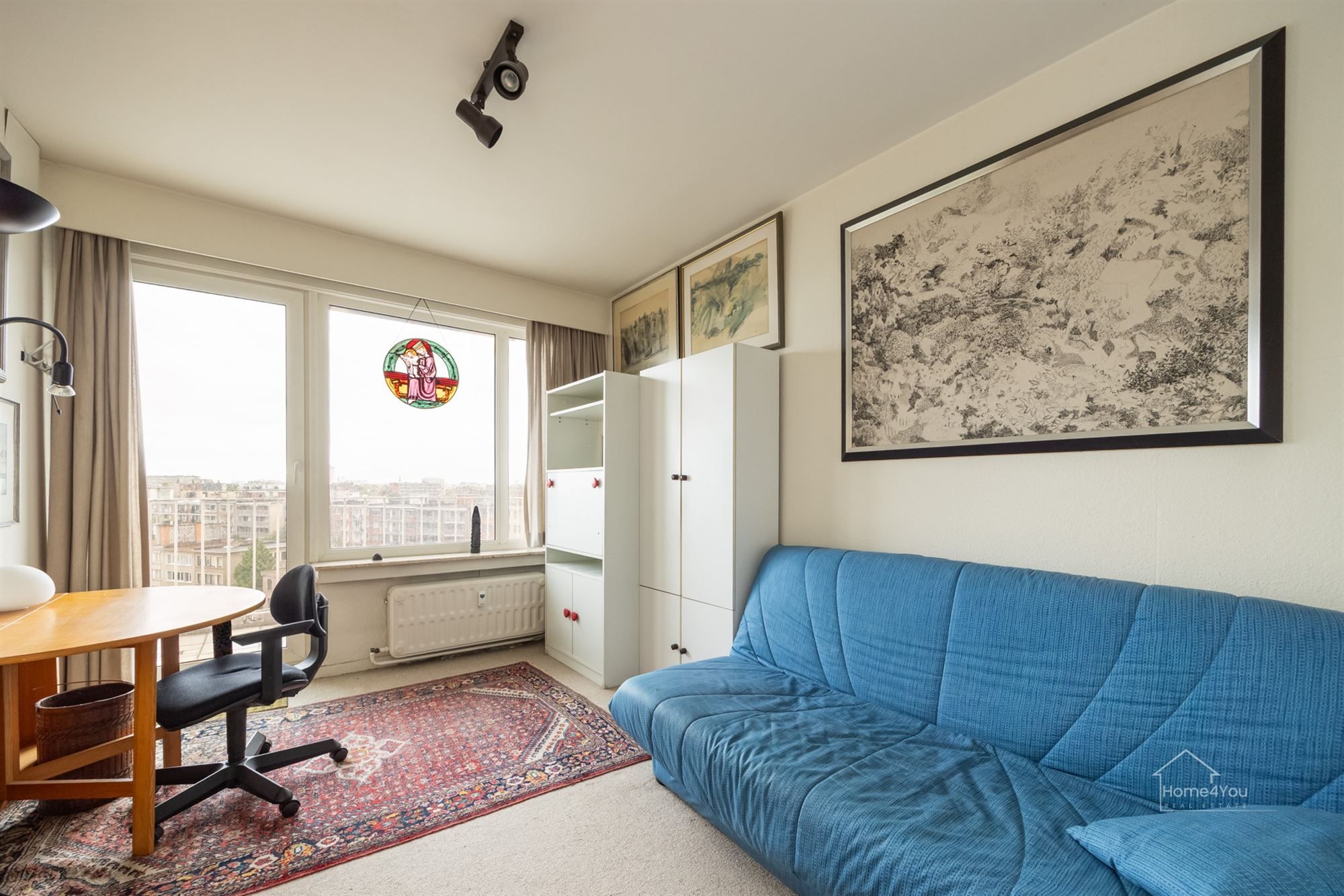 Licht en ruim appartement met uitzicht op het Rivierenhof foto 7