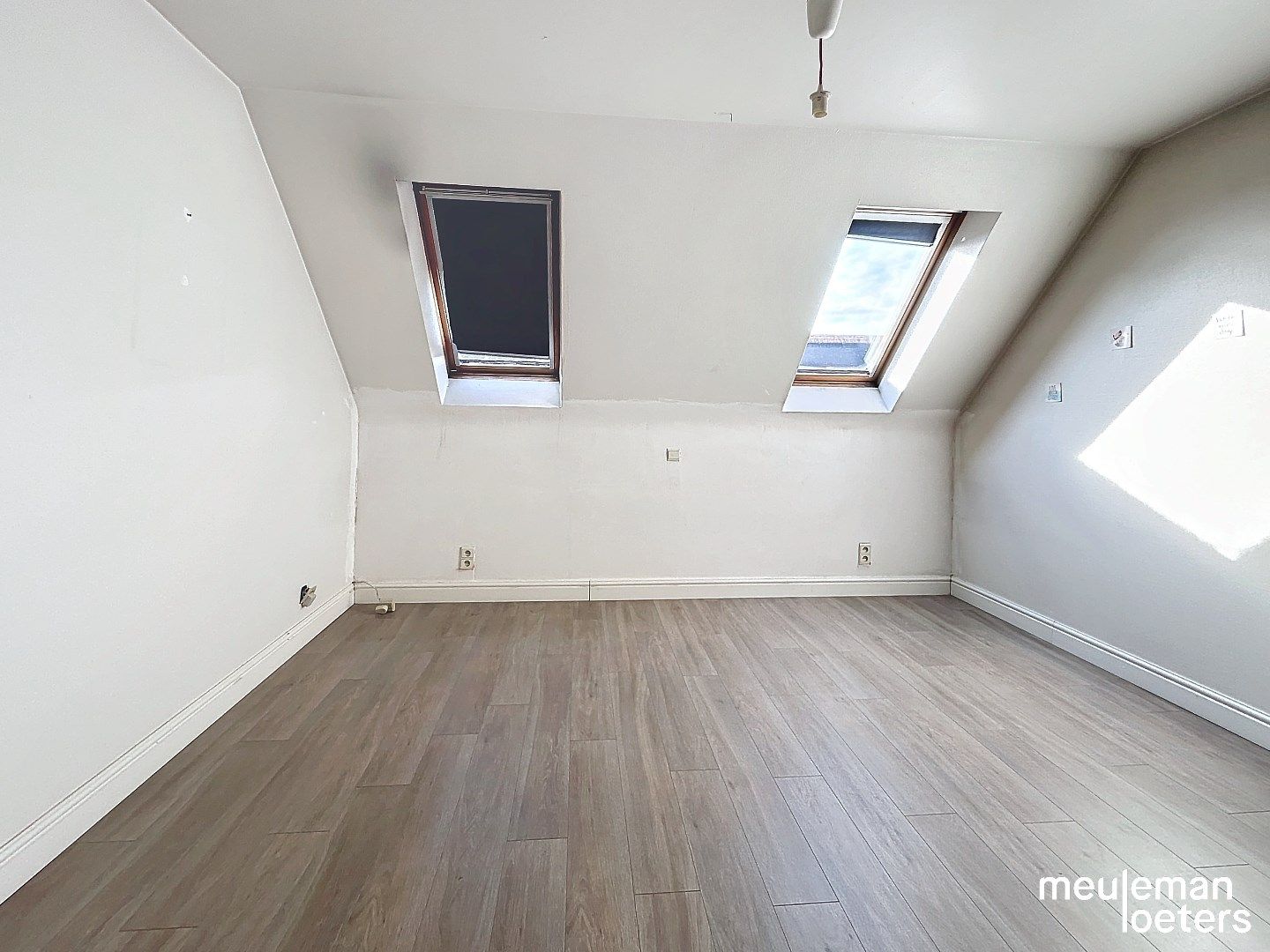 Ruim duplexappartement met garagebox foto 6