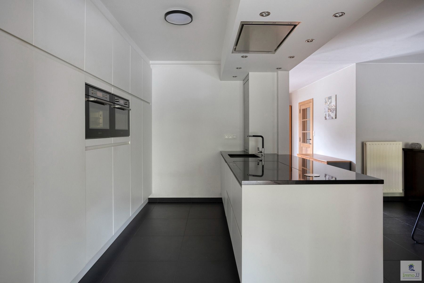 Halfopen bebouwing met zwembad foto 8