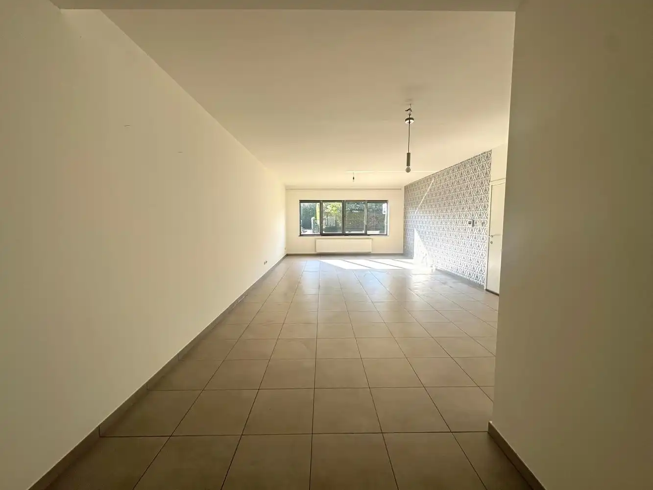 RUIM GELIJKVLOERS APPARTEMENT MET TERRAS EN TUIN foto 3