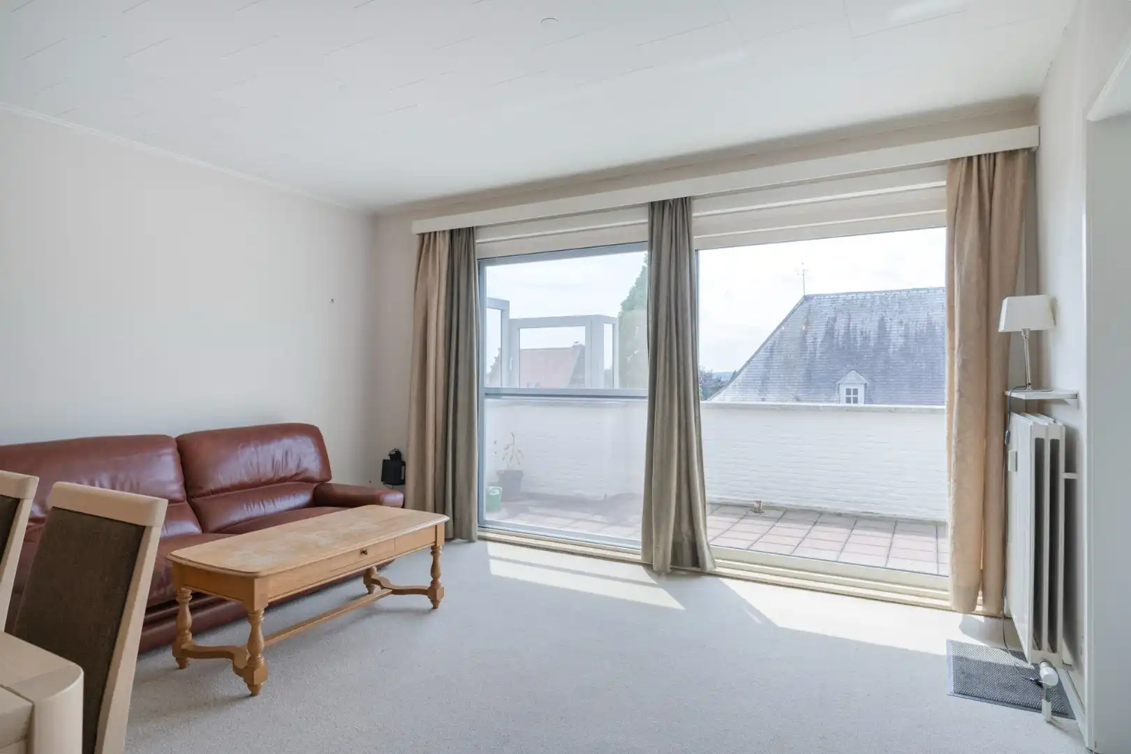 Ruim appartement op de 3° verdieping in hartje Hoeselt, met 3 slaapkamers, garage en prachtig terras met panoramisch uitzicht.  foto 8