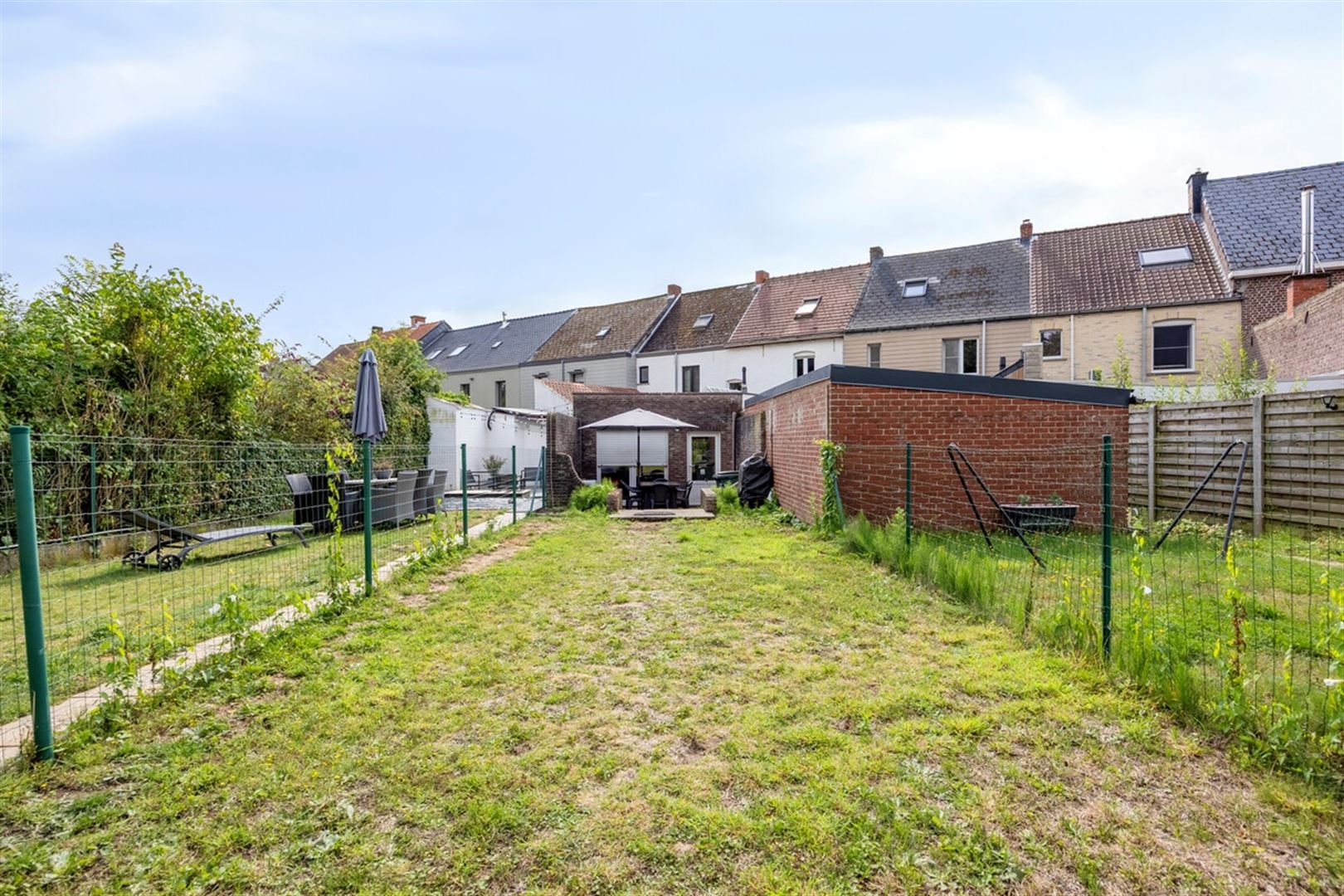 Ruime rijwoning met garage foto 25