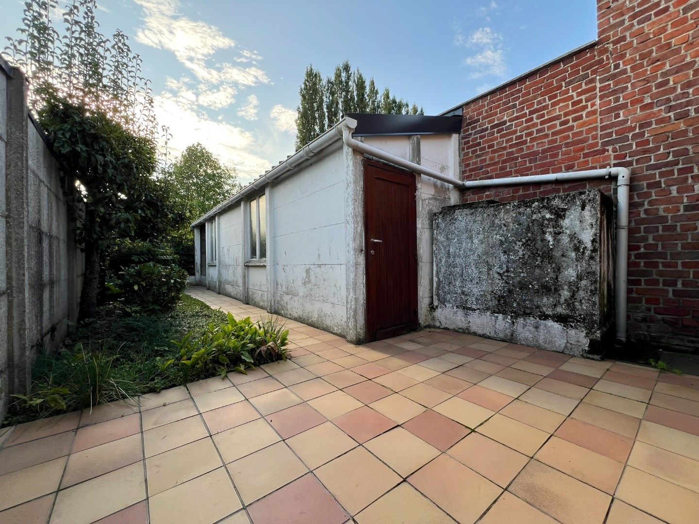 Rijwoning met zonnige tuin in de dorpskern. foto 15