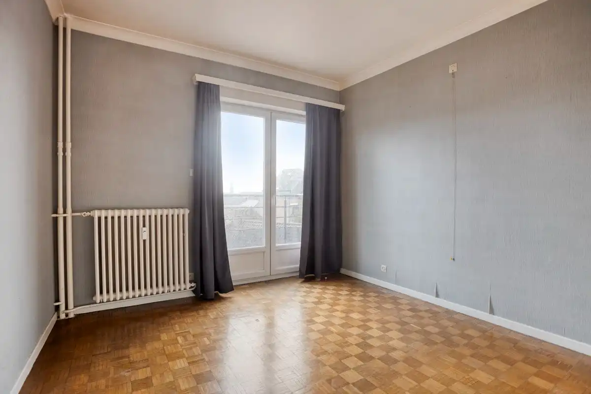 Ruim appartement met 3 slaapkamers, kelderberging en garagebox aan de rand van het centrum foto 13