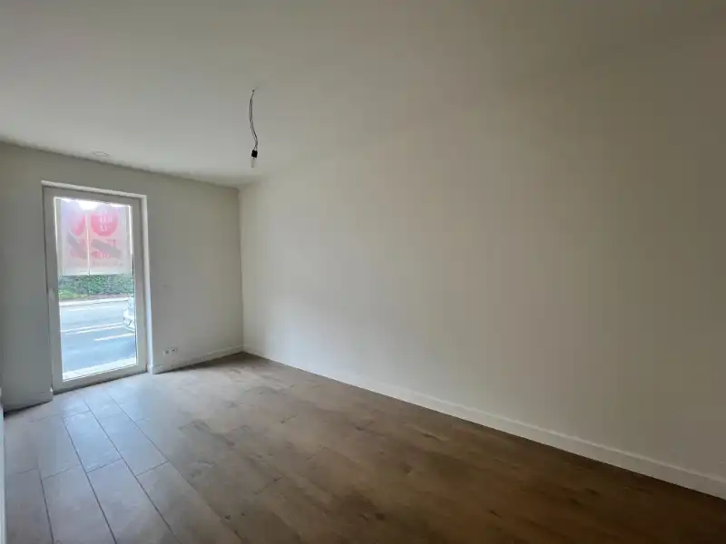 Energiezuinig 2 slpkm appartement met terras, tuin en staanplaats foto 12