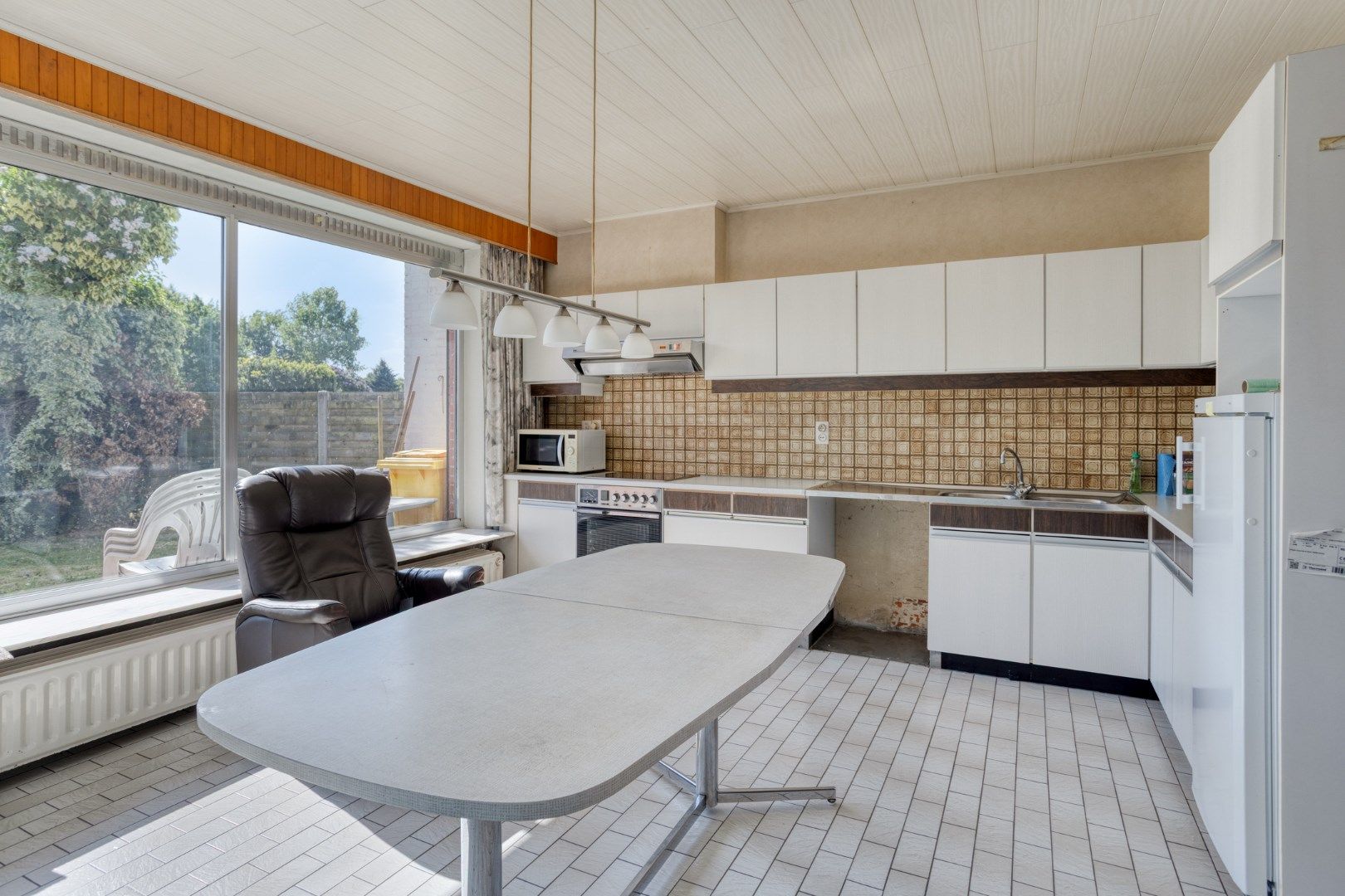 Woning met 4 slpks op een perceel van 670 m² te Millegem. foto 9