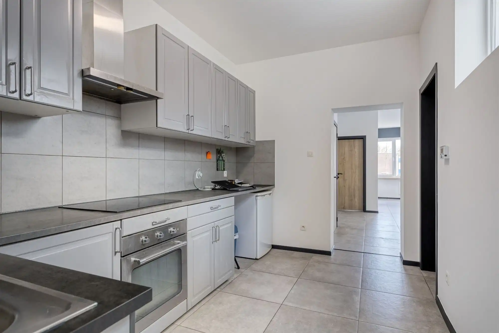 Ruime kangoeroe woning met 5 slk + 2 badk + terras in Lier foto 6