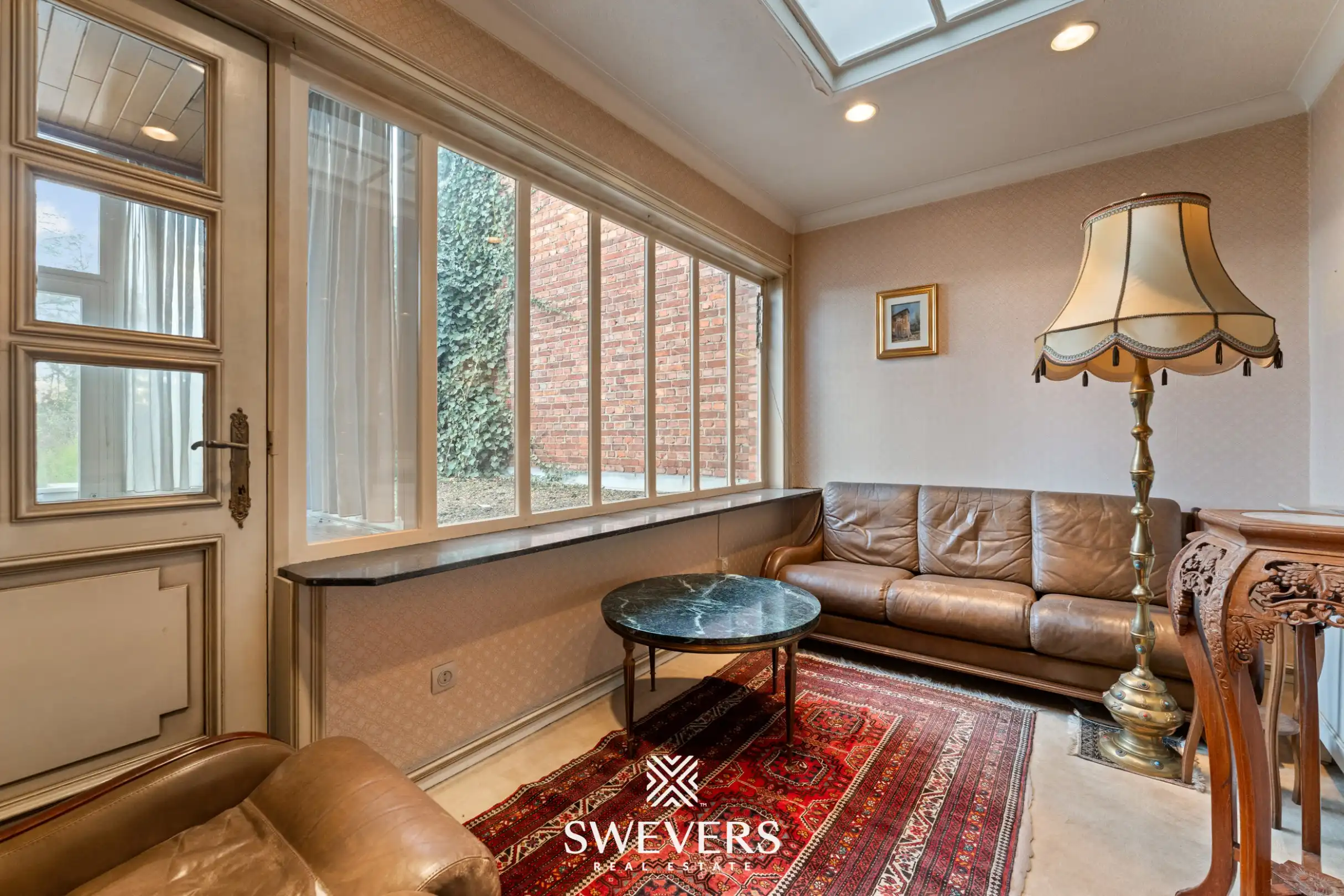 Karaktervolle halfopen bebouwing met uitzonderlijk potentieel en zonnige tuin nabij Hasselt centrum foto 8