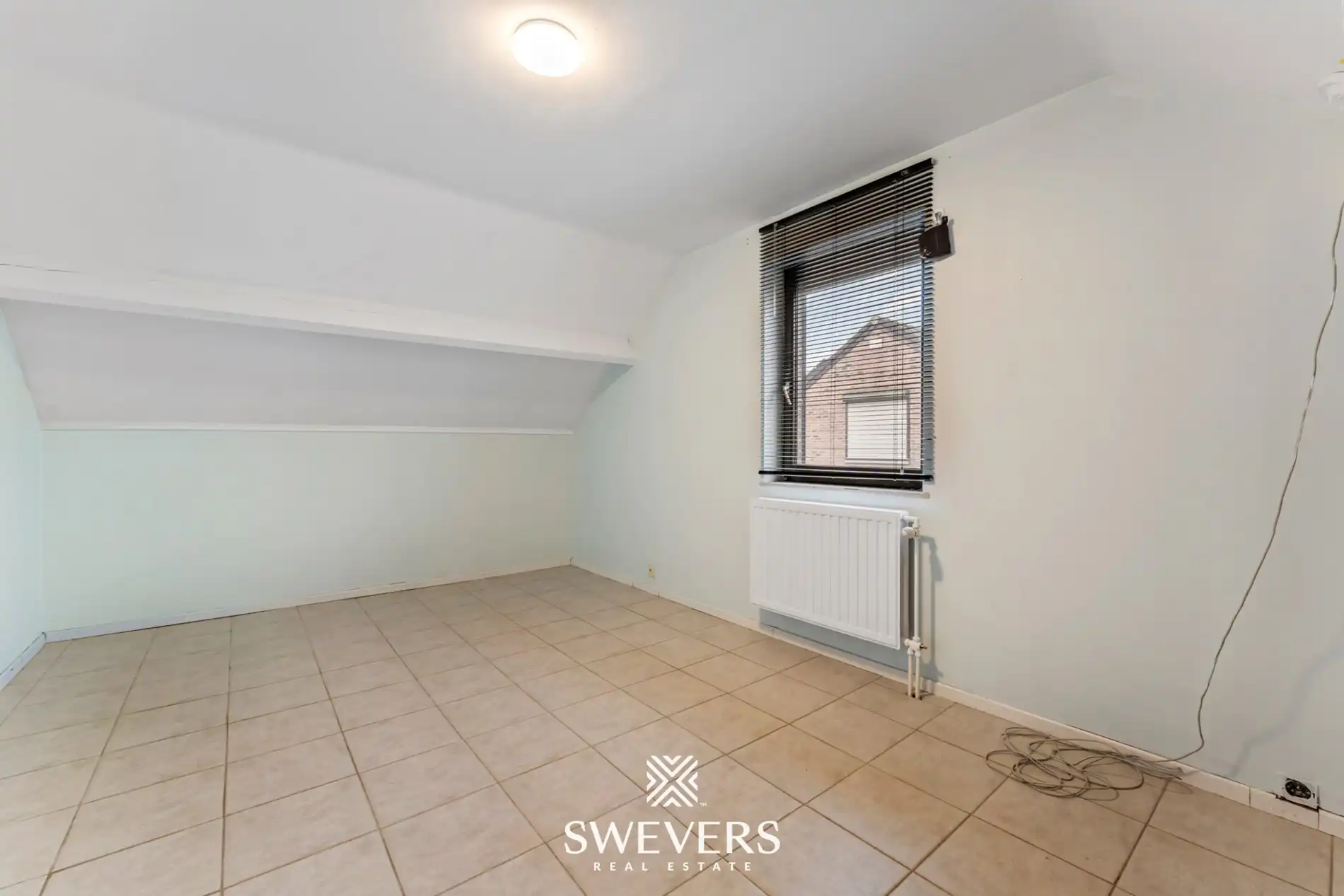 Instapklare open bebouwing met zuidgerichte tuin nabij het centrum van Heusden foto 15