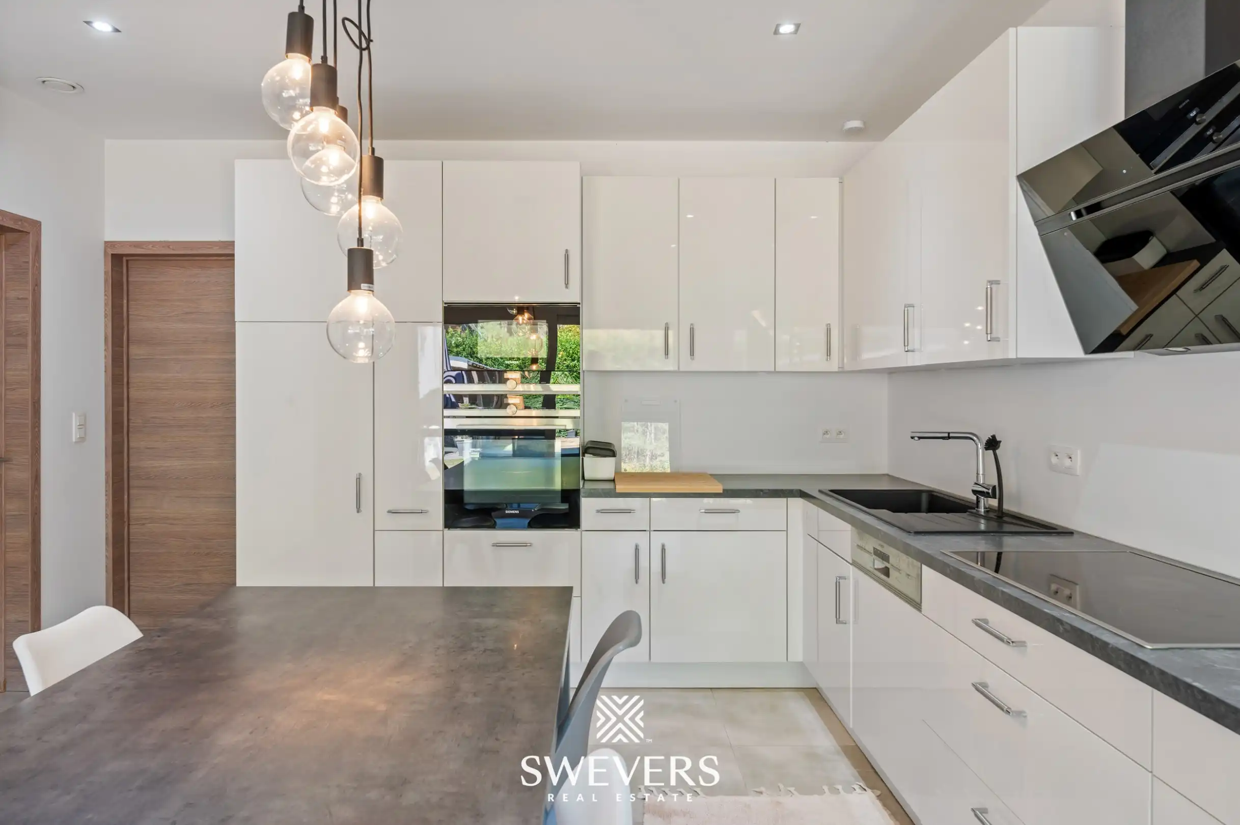 Moderne halfopen bebouwing met 3 slaapkamers op rustige ligging in Koersel foto 9