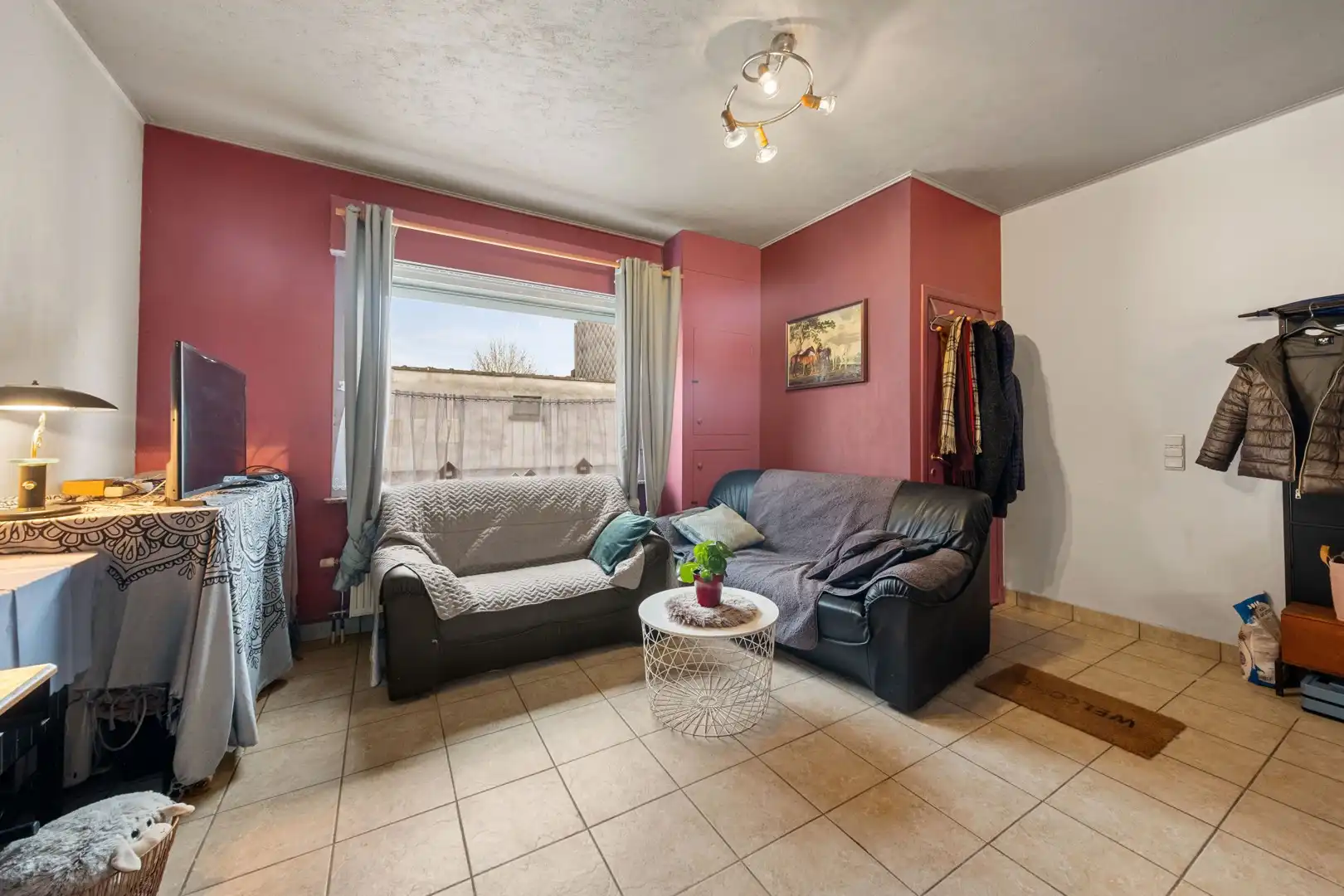 Charmante starterswoning met tuin in Flora, Merelbeke. foto 4