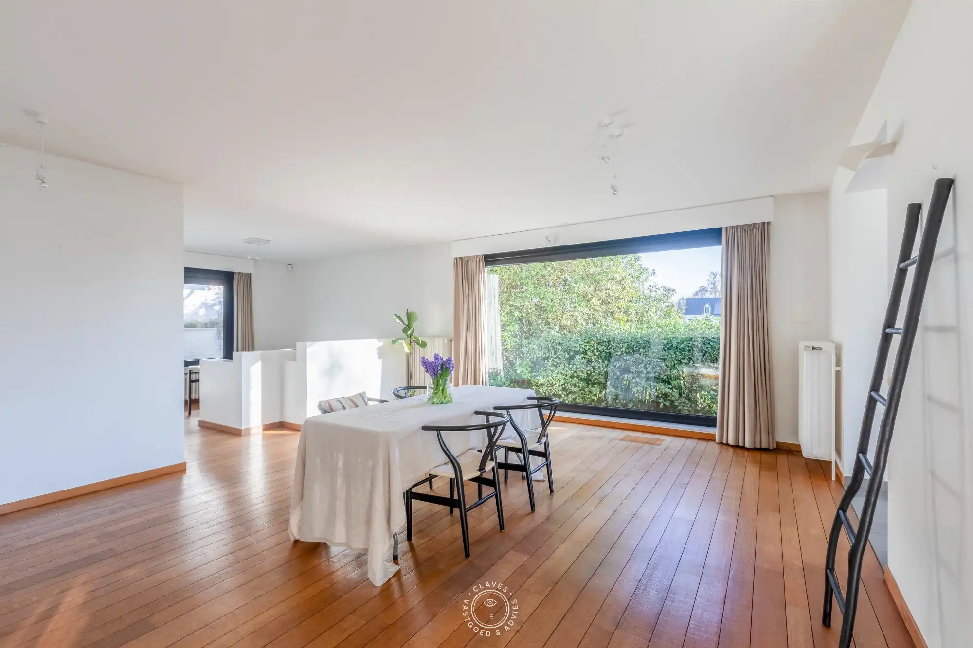 Een unieke combinatie van wonen, werken en genieten in Waasmunster foto 11