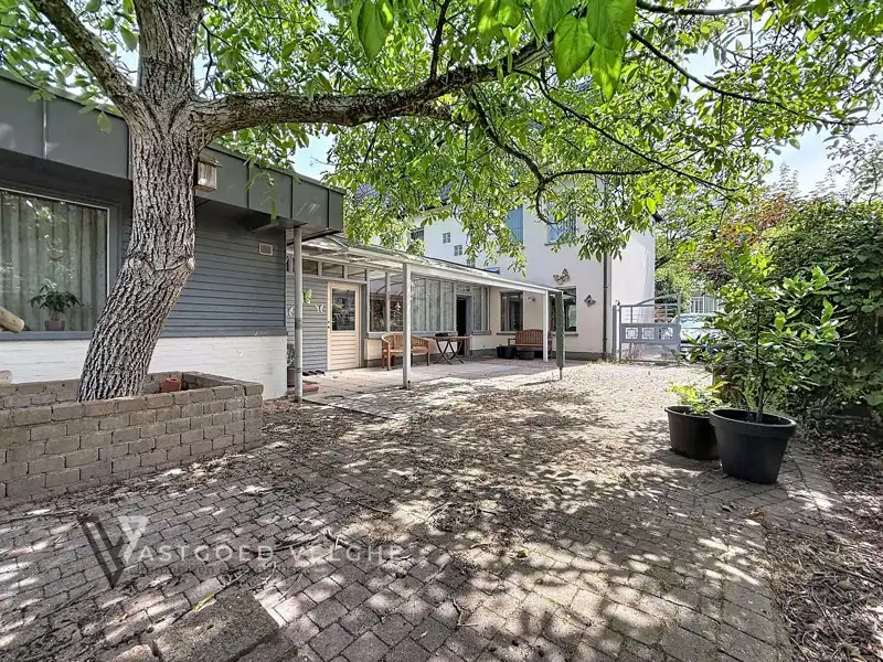 Ruime gezinswoning met zorgwoning in Genk-Centrum foto 35