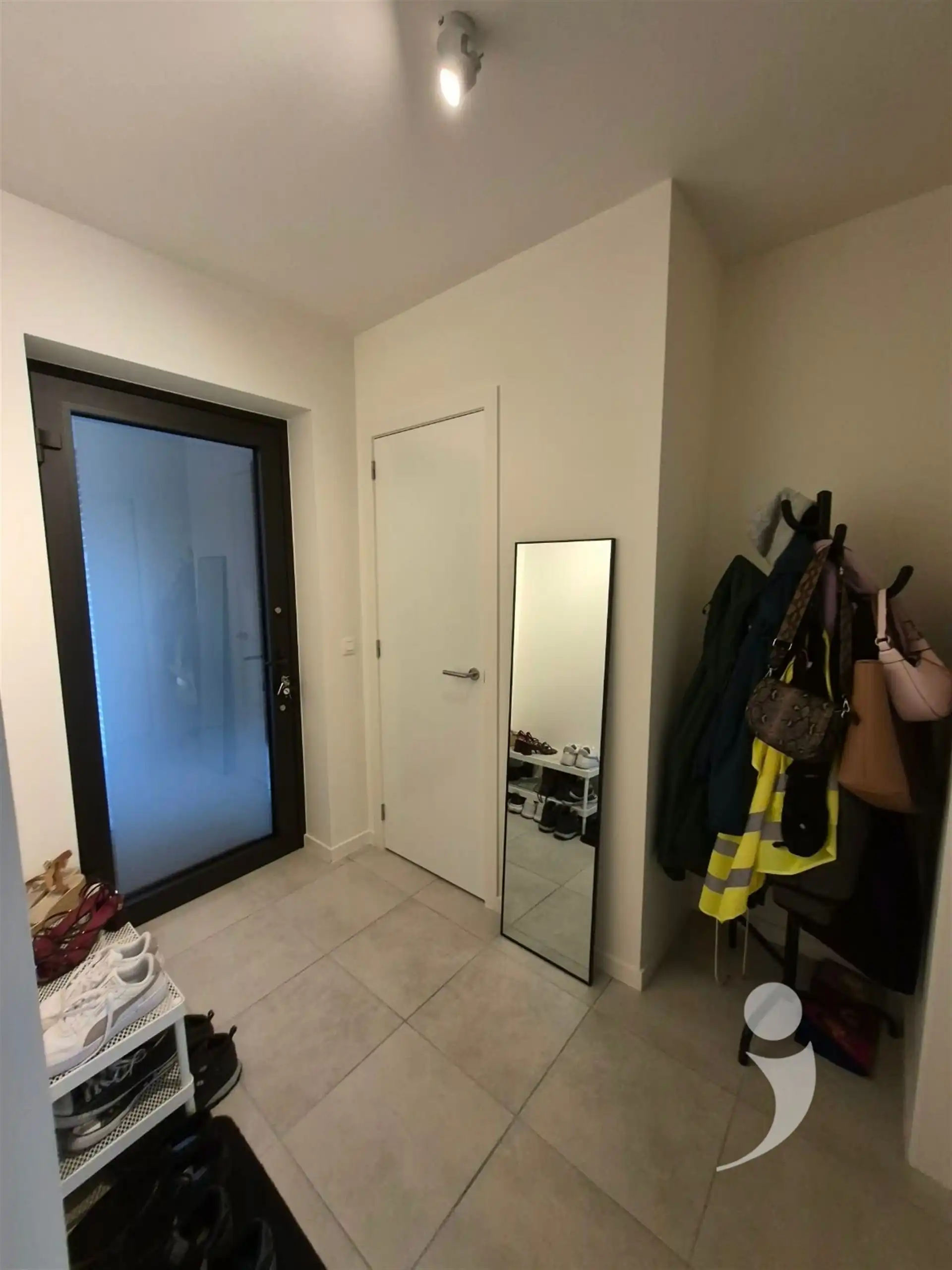 Recent gelijkvloers appartement met staanplaats voor de wagen foto 17