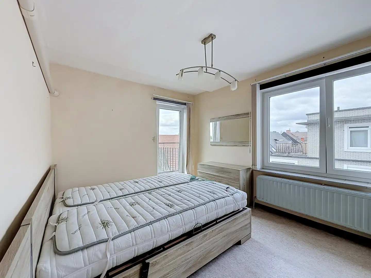Ruim appartement met zonnig terras, uitzonderlijk ruime garage en kelderberging op wandelafstand van de Grote Markt van Tienen foto 6