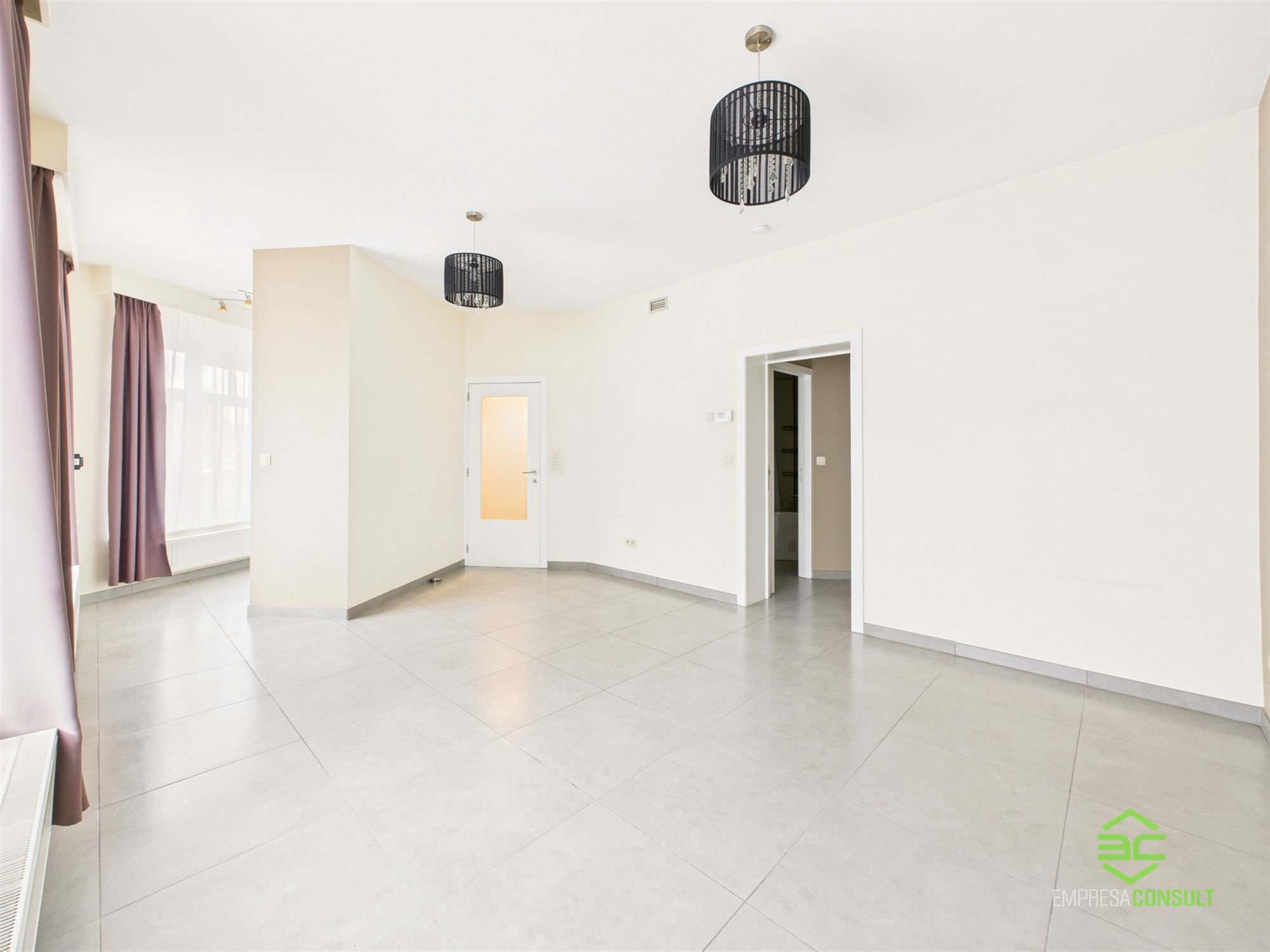 Interessant opbrengsteigendom met 4 app in het centrum! foto 6