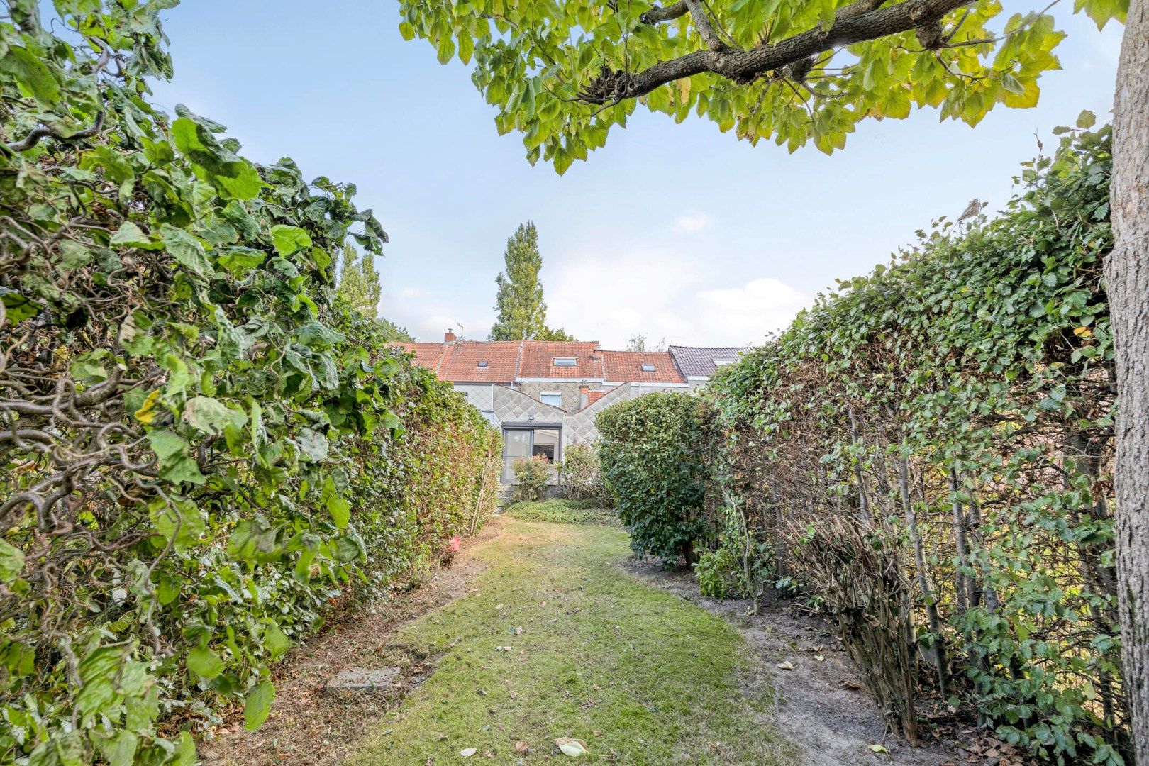 Verzorgde woning met 3 kamers, diepe tuin én garage! foto 21