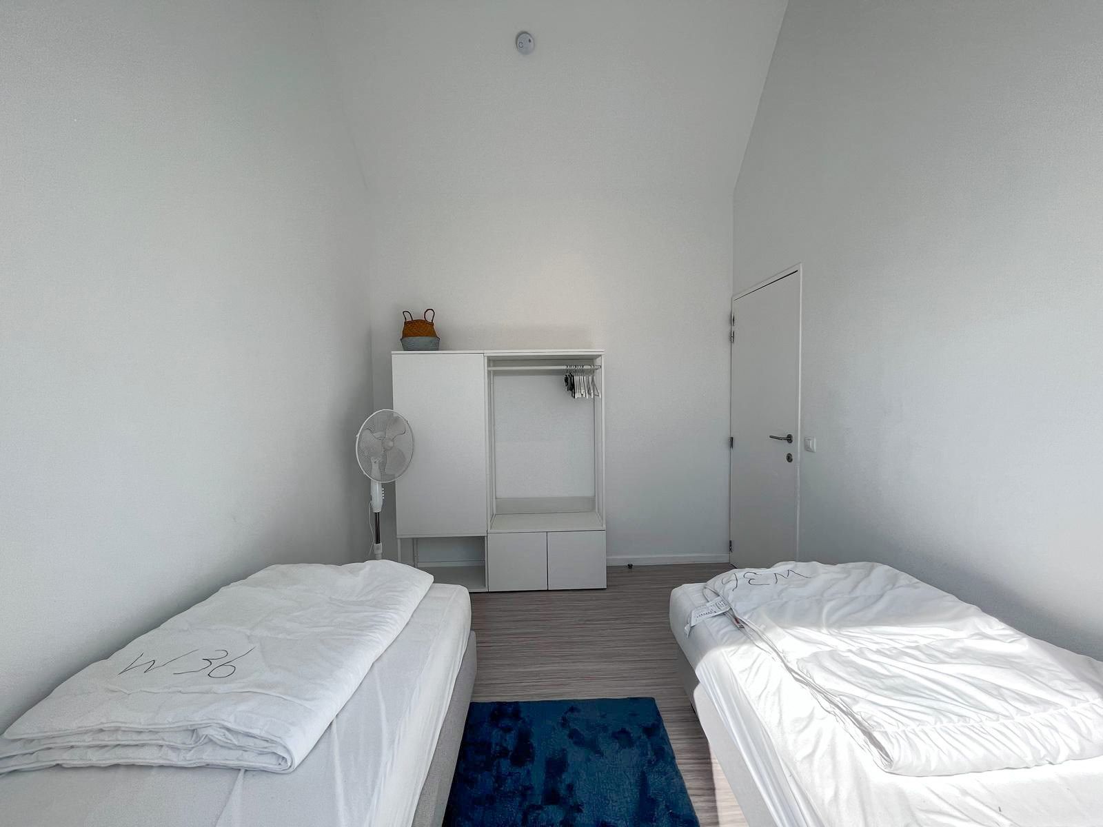 Vakantiewoning met zuid gerichte tuin op wandelafstand van de beschermde duinen  foto 11