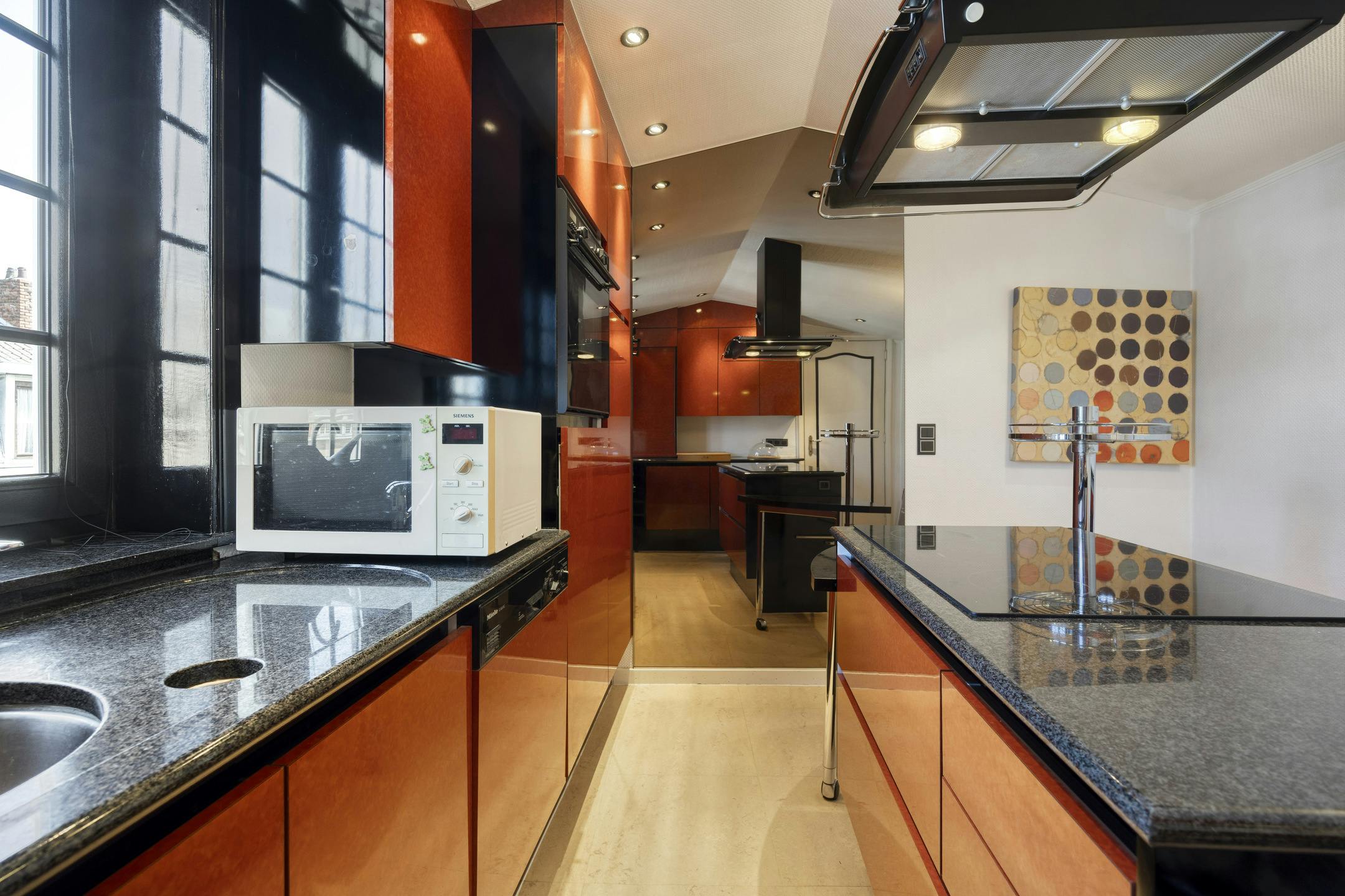 Karaktervolle driegevelwoning met commerciële ruimte in hartje Vilvoorde foto 40